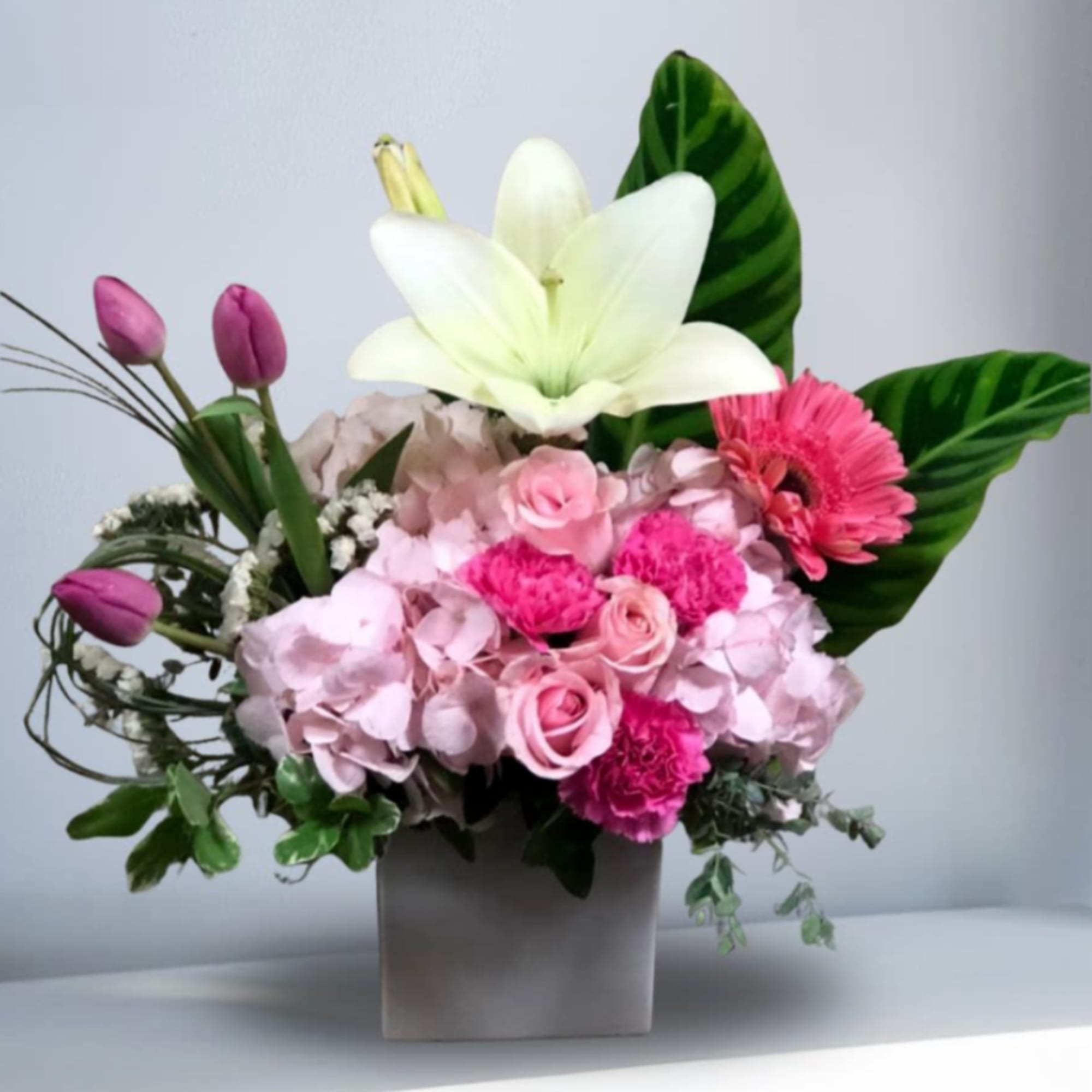 Type of Flowers: White Lilies, Pink and White Hydrangeas, Pink Roses, Pink