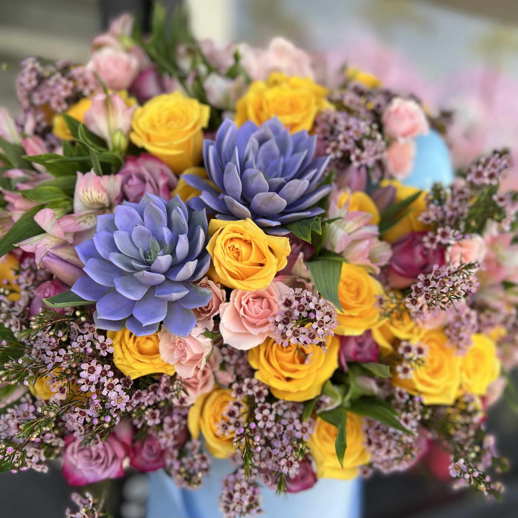 Introducing our Easter Delight Floral Arrangement, a whimsical and festive display that