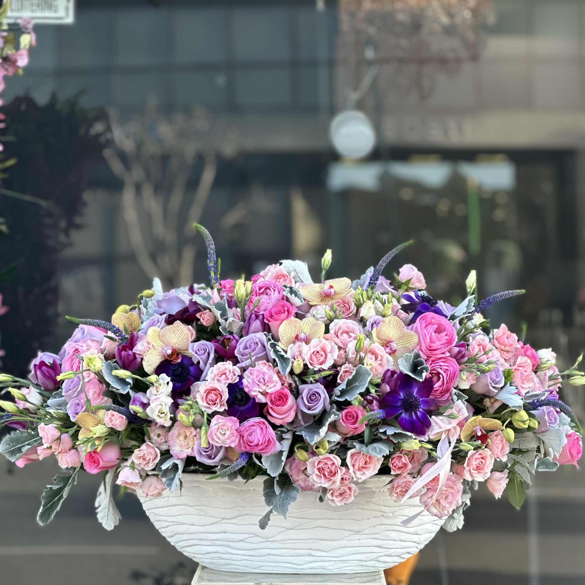 Premium flowers in a grand ceramic vase