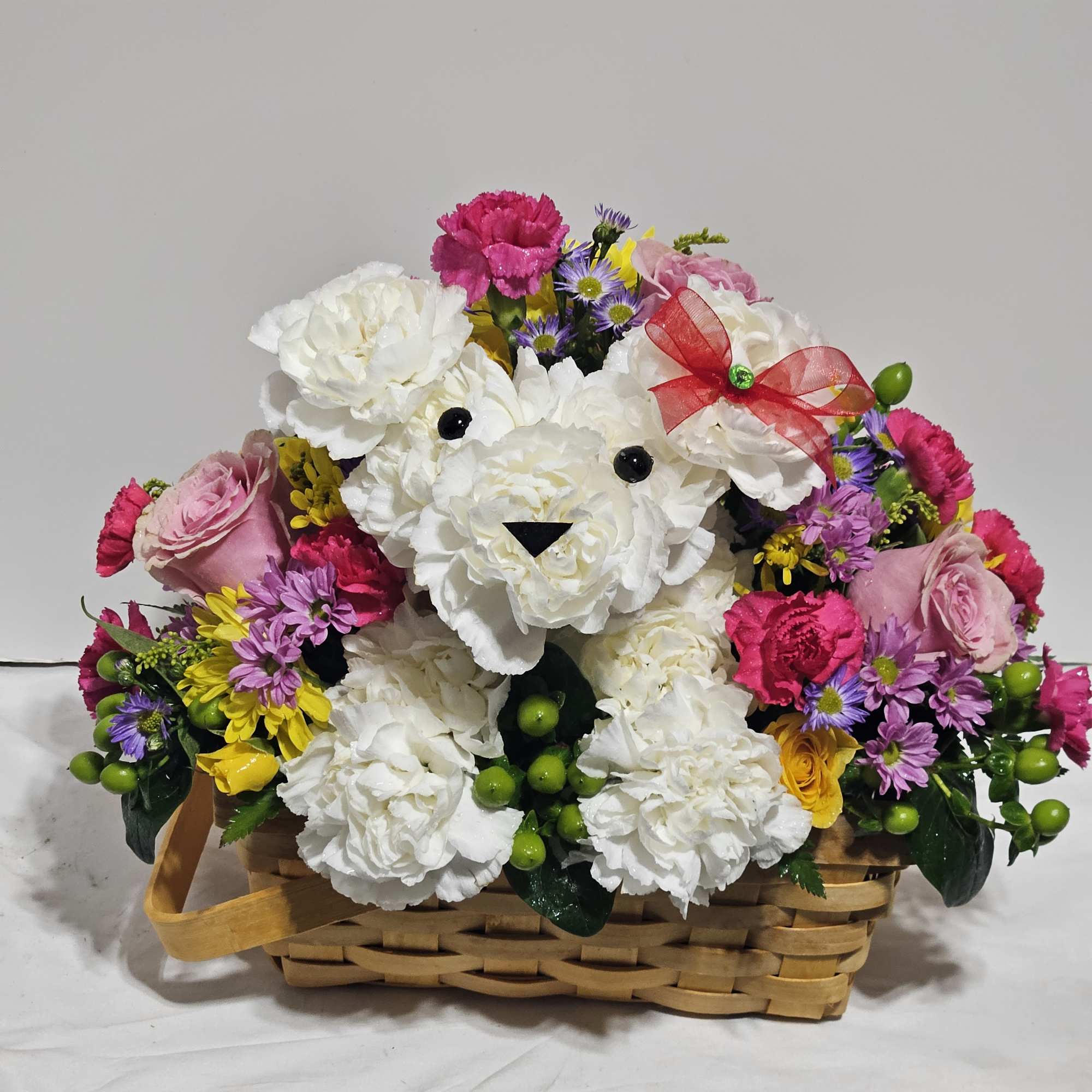 Unleash smiles with our original fun Flowerdog basket floral creation. Hand-designed in