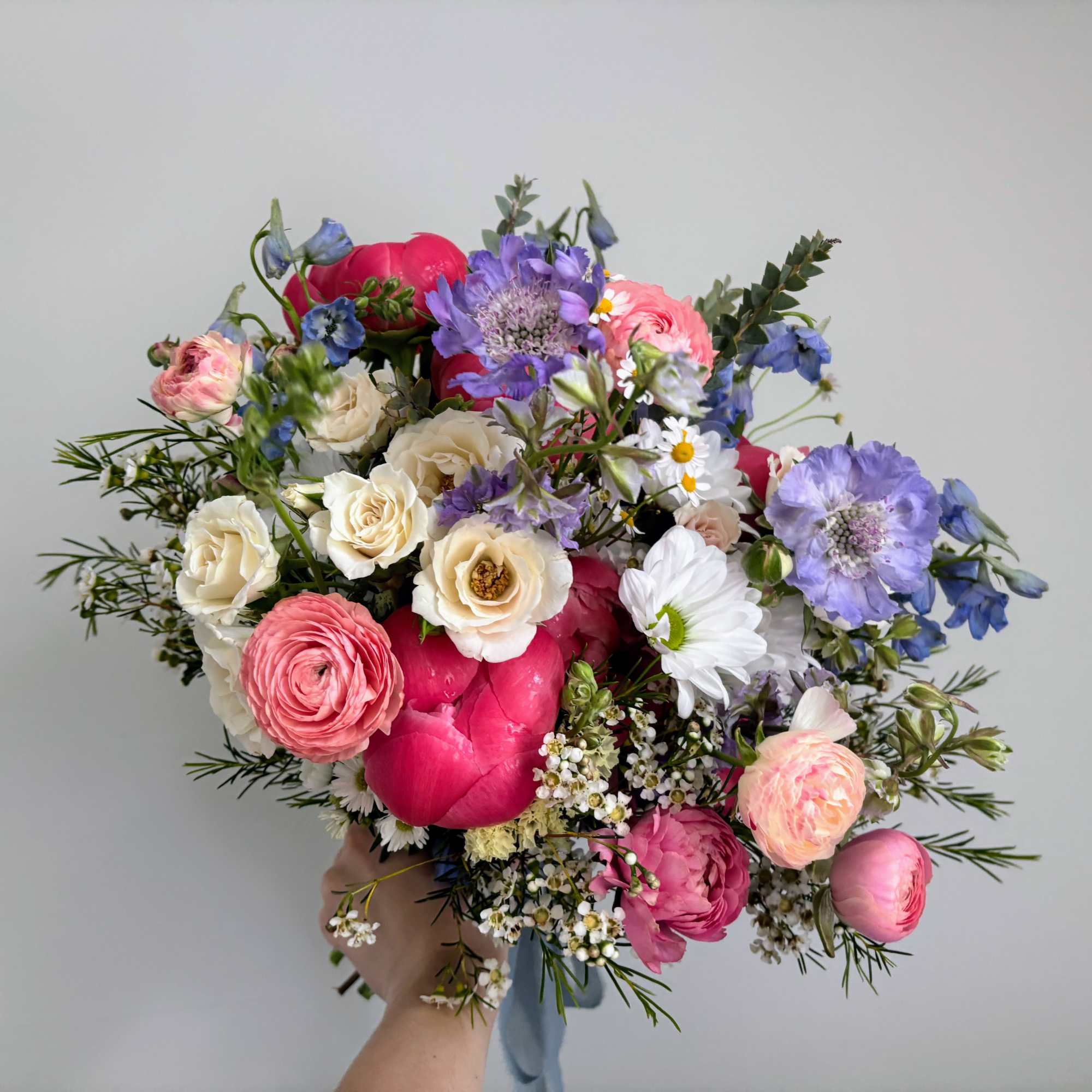 Pinks, Purples and Blues come together in this pastel arrangement. The perfect