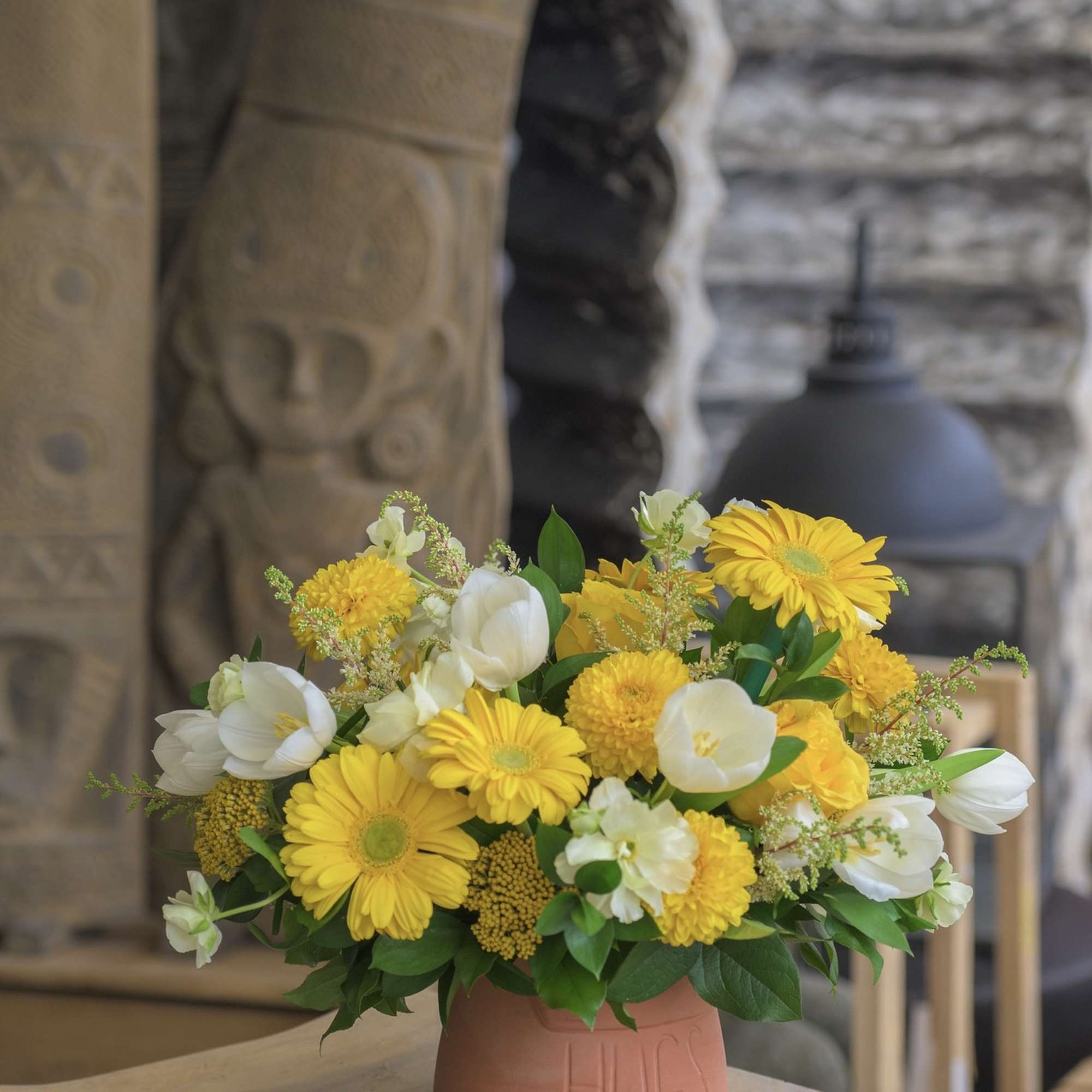 Avant Gardens Exclusive Arrangement. A vase filled of Hugs and Flowers.