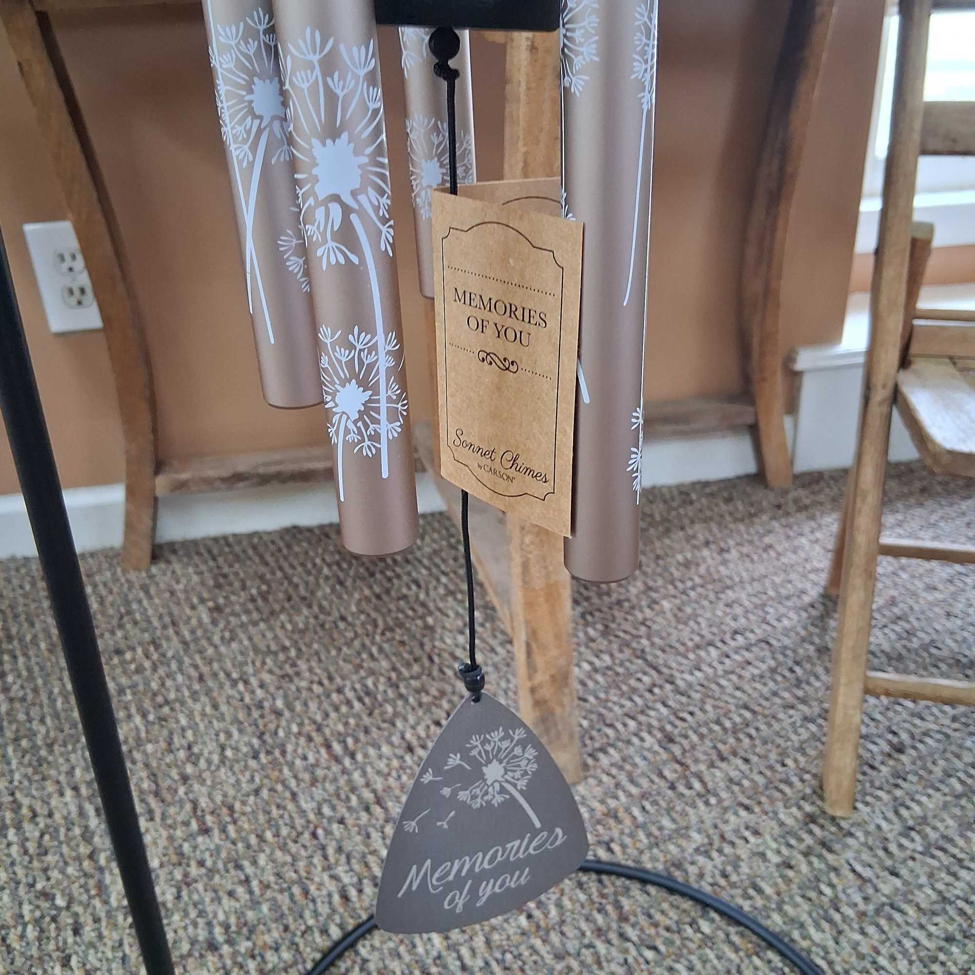 30" wind chime on stand.
Comes with stand, silk greens and bow.
Memories of