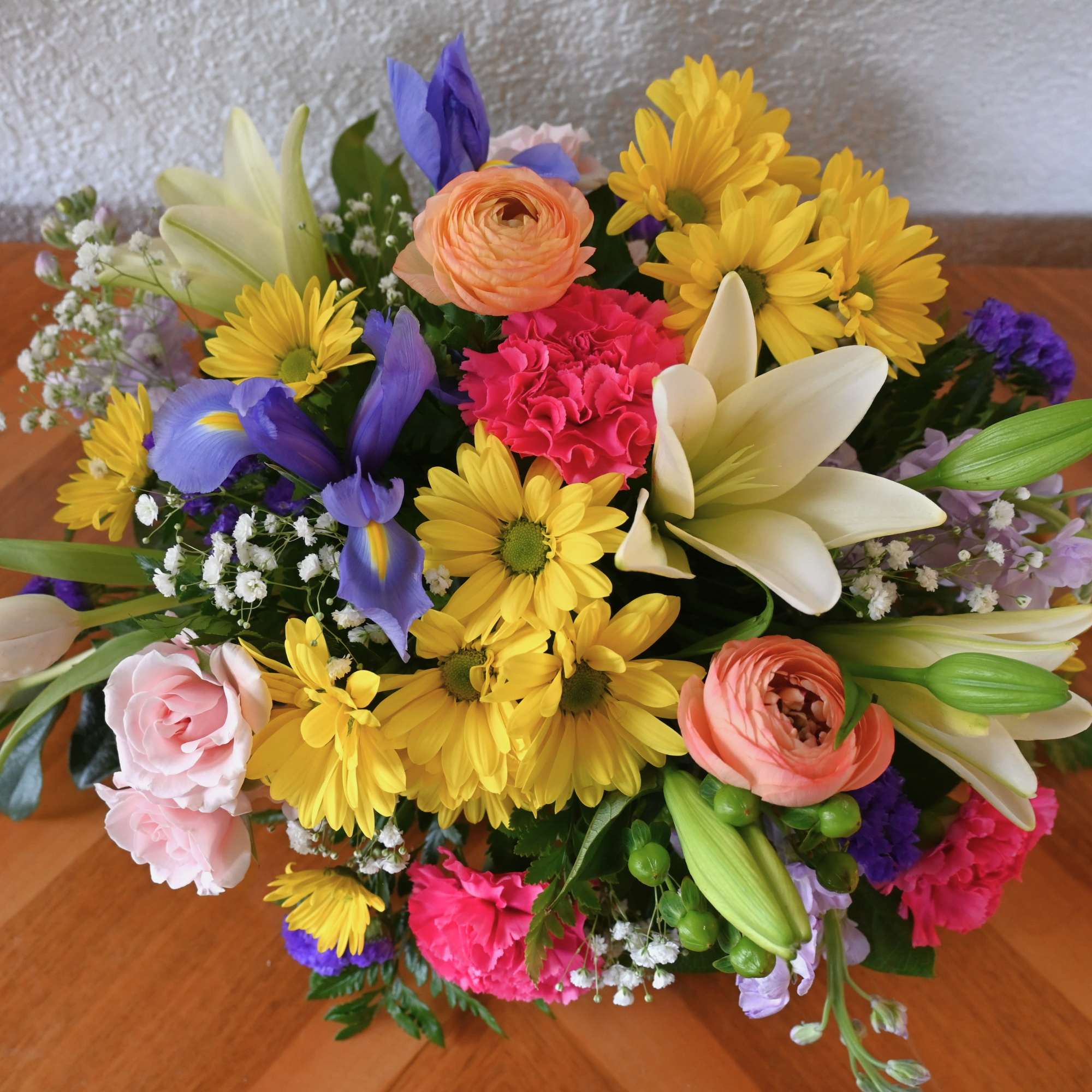 Adorn your table with fresh, seasonal blooms in an array of cheerful