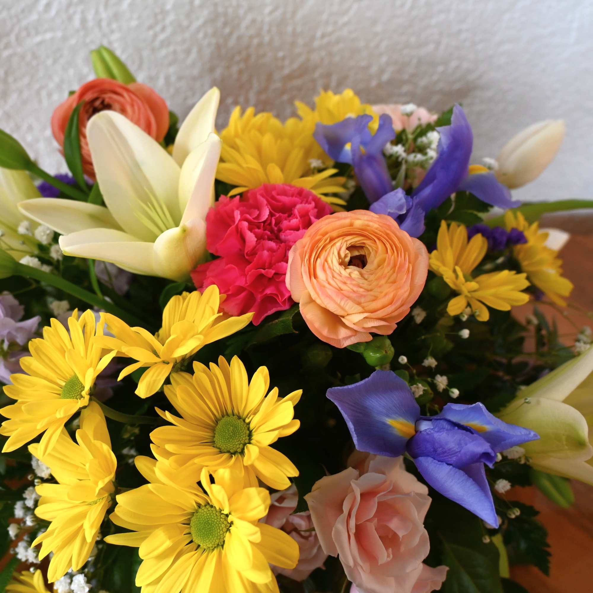 Adorn your table with fresh, seasonal blooms in an array of cheerful