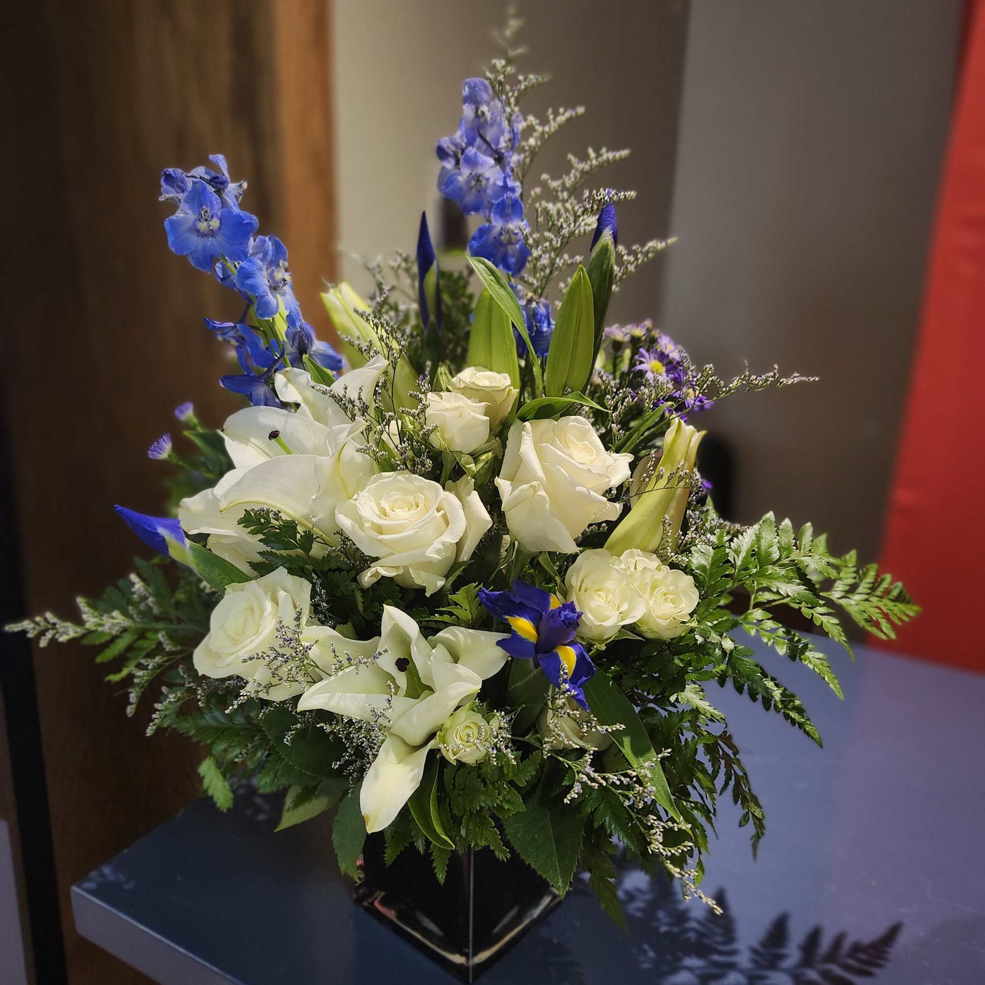 Elevate any space with the enchanting Blue Serenity Bouquet. This exquisite arrangement