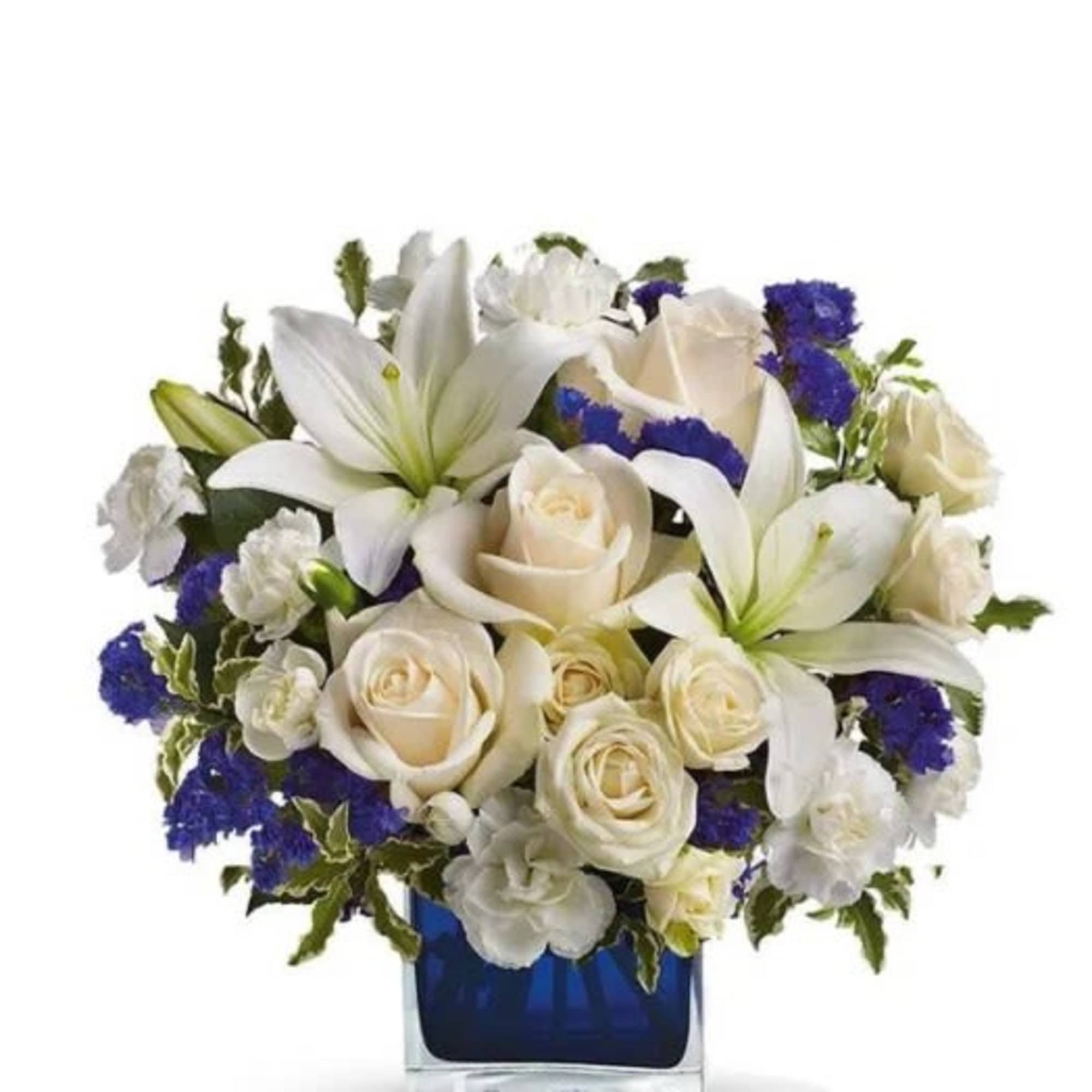 Blue Life arrangement comes in a glass blue cube, includes white lilies