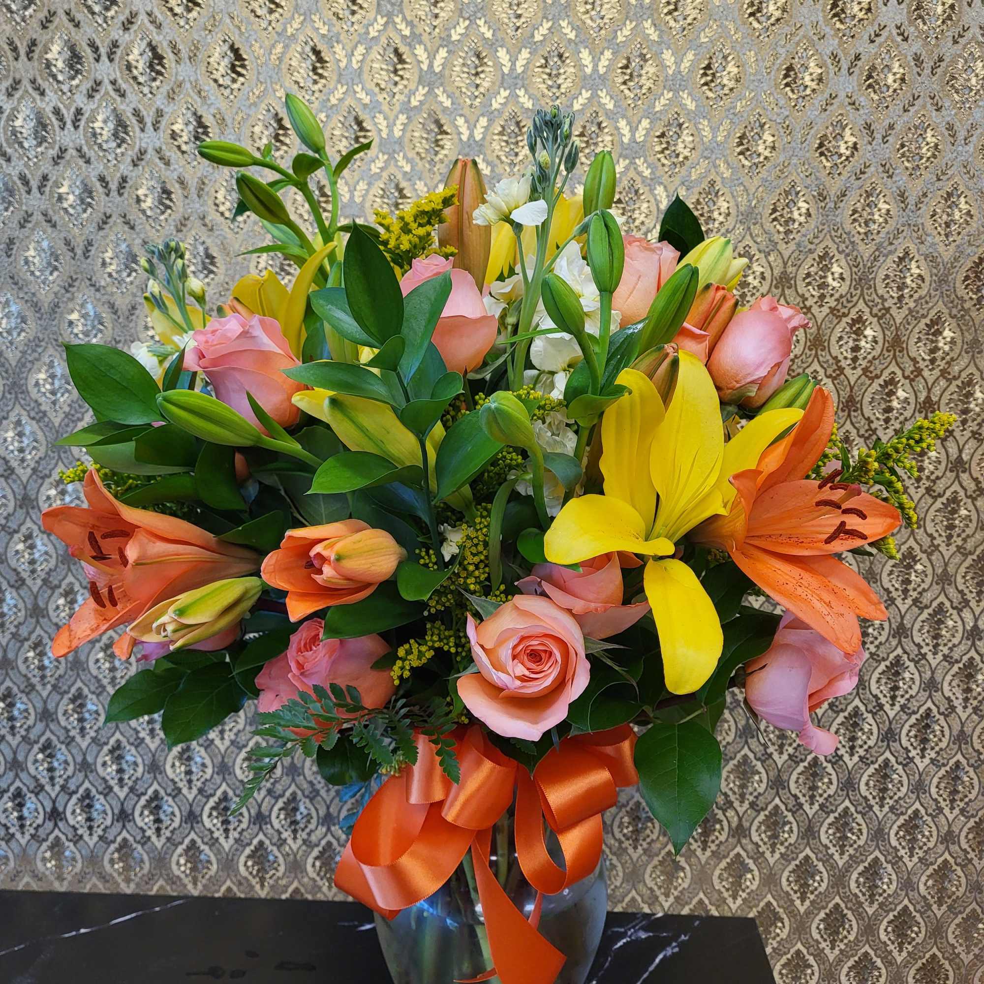 Ellie flowers exclusive, designer choice in a clear vase.

Pictures for reference only.

Includes