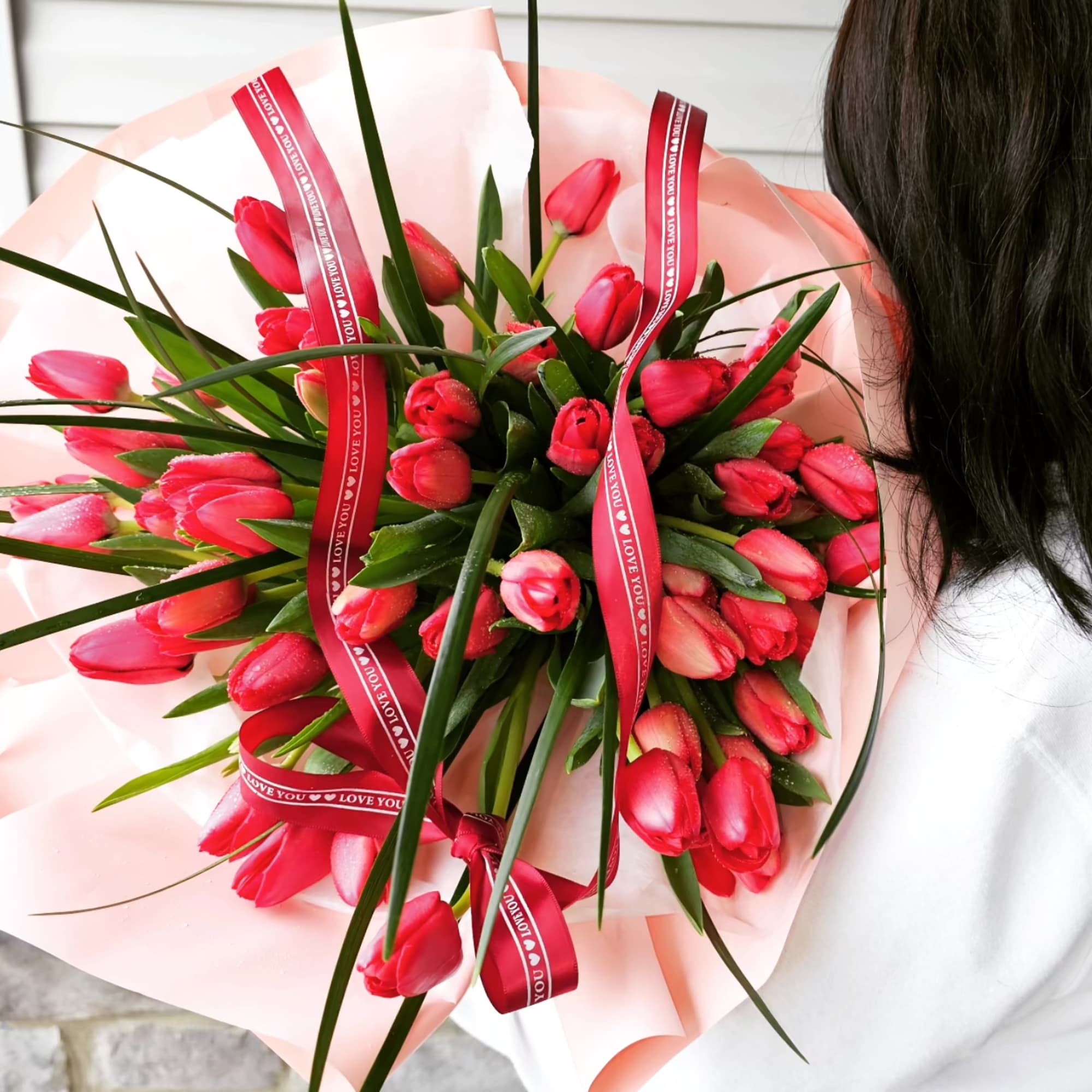 Gorgeous bouquet of red tulips. The most popular flower of spring! On