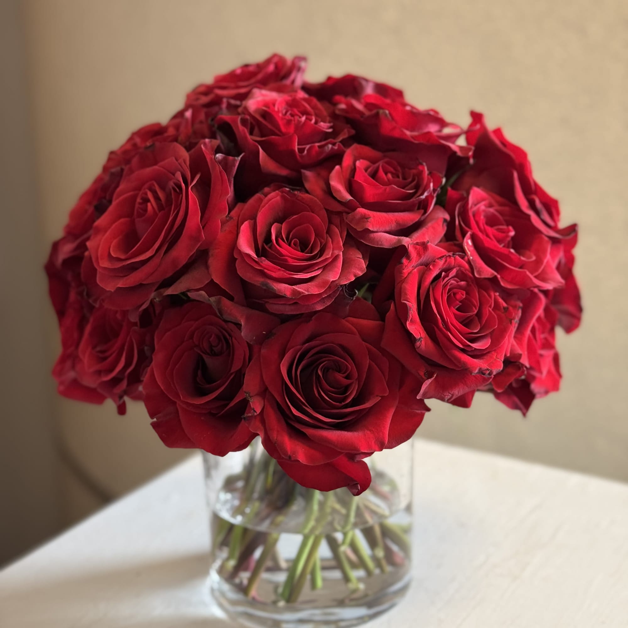 A timeless bouquet of premium 30 stems of red roses beautifully arranged