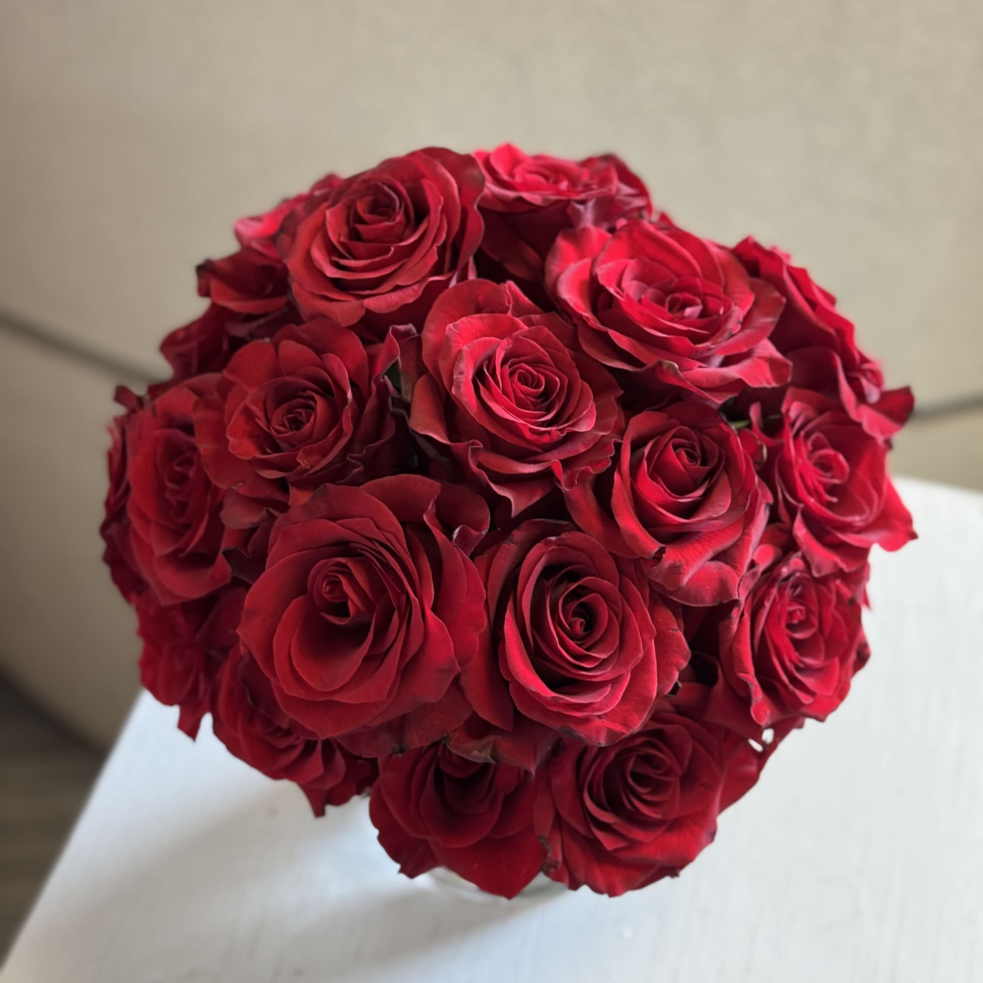 A timeless bouquet of premium 30 stems of red roses beautifully arranged