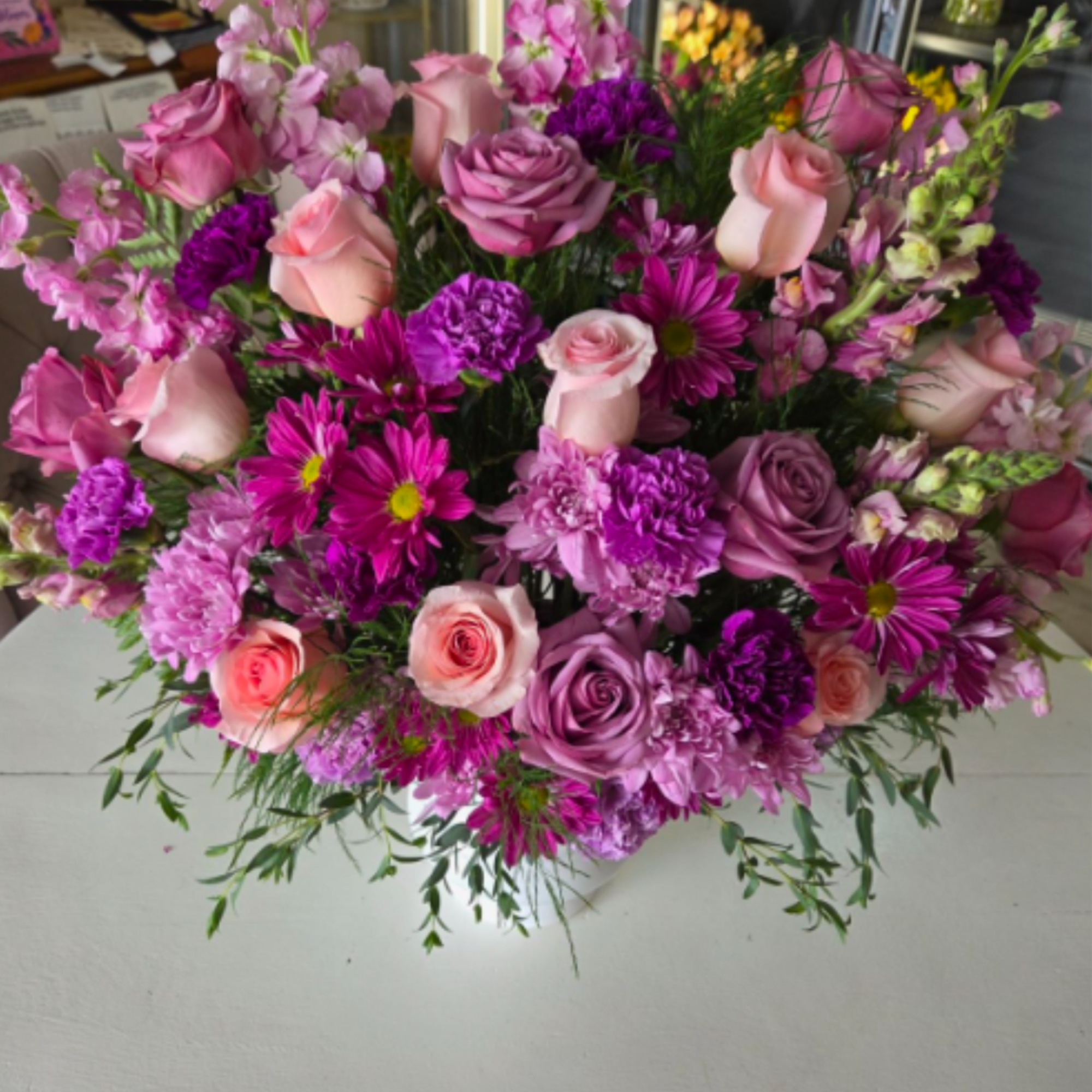 Grace is a tender and comforting sympathy arrangement in soft shades of