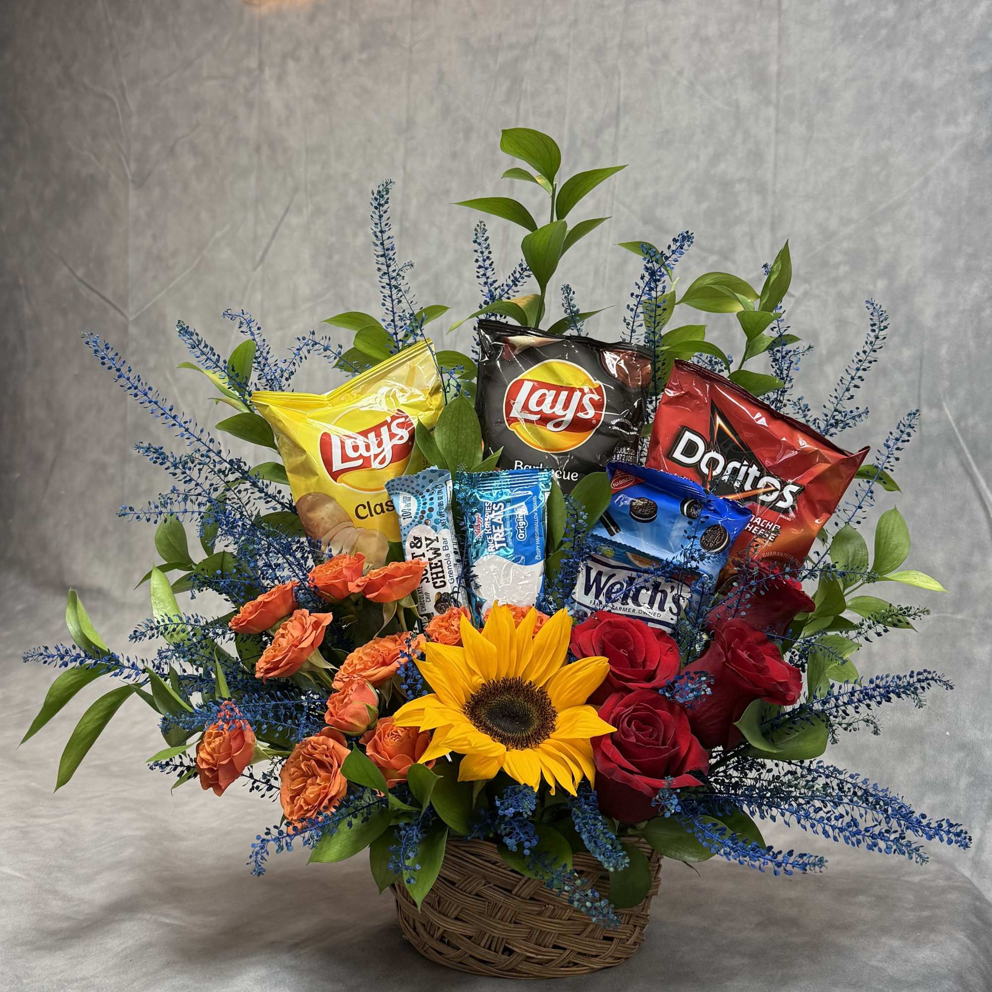 Flowers for the heart, snacks for the soul. This basket is a