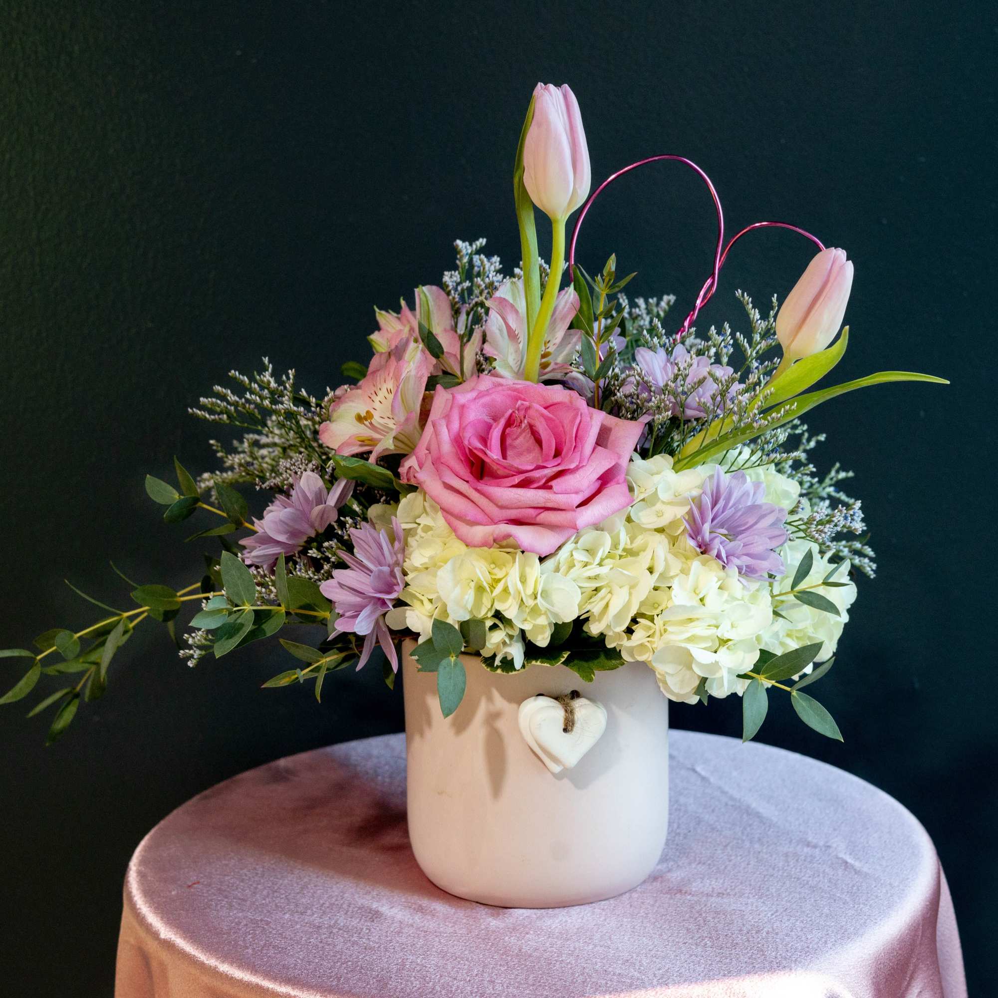 This short sweet arrangement is a soft expression of love, designed to