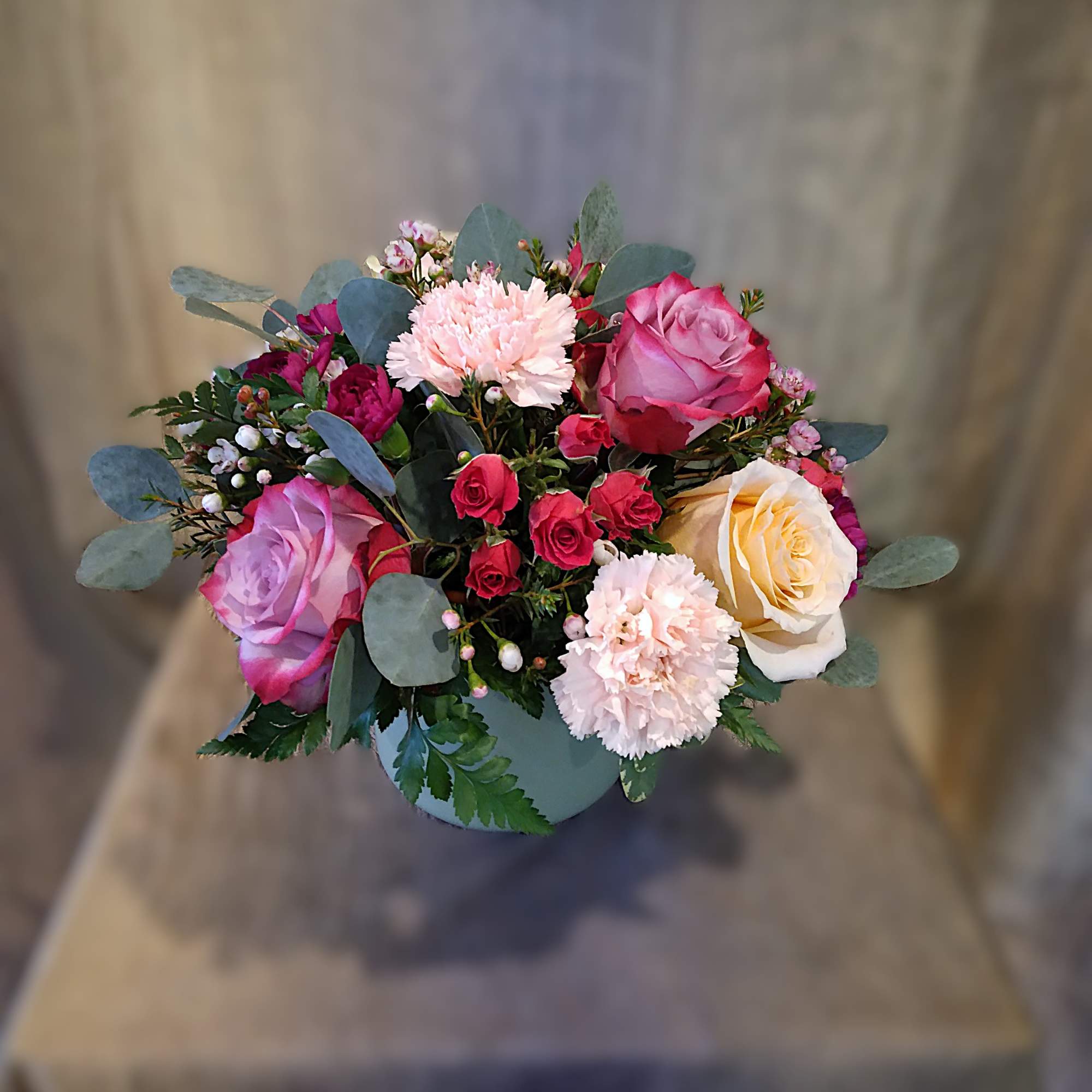 A soft mix of pink, peach and purple showcasing delicate textures in