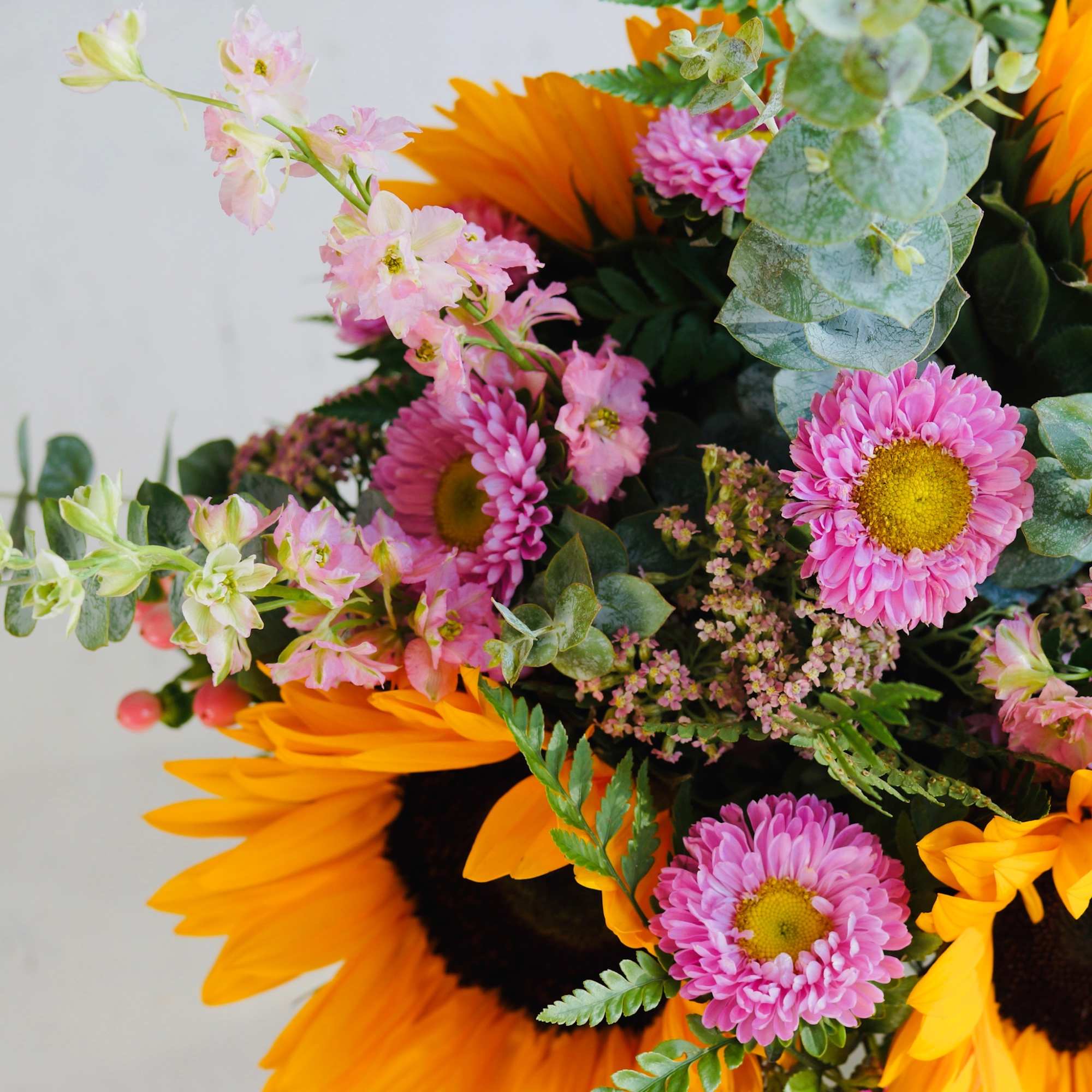 Perfect mix of Sunflowers and Barbie Pink blooms