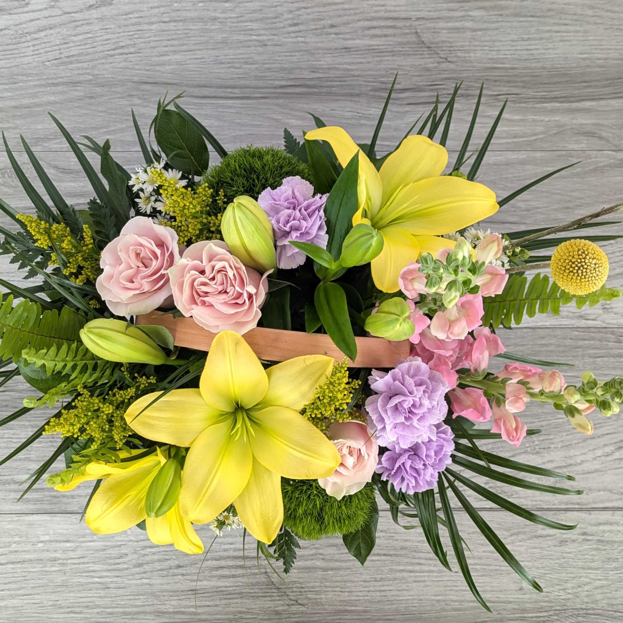 New Beginnings is A Ladybug Floral exclusive bouquet. This bouquet features lilies