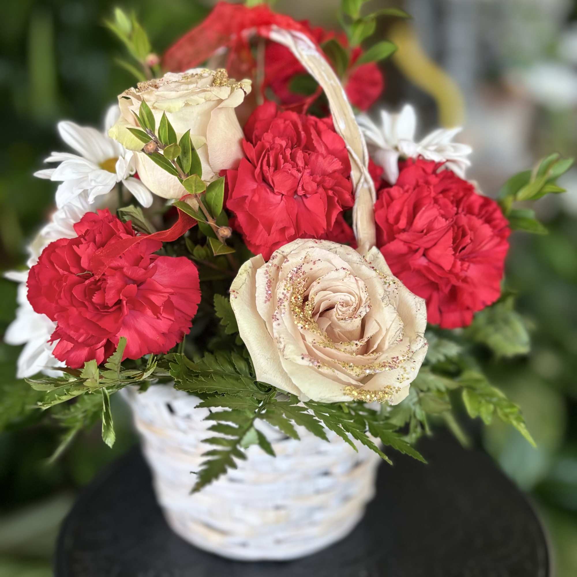 Fresh flowers in basket 