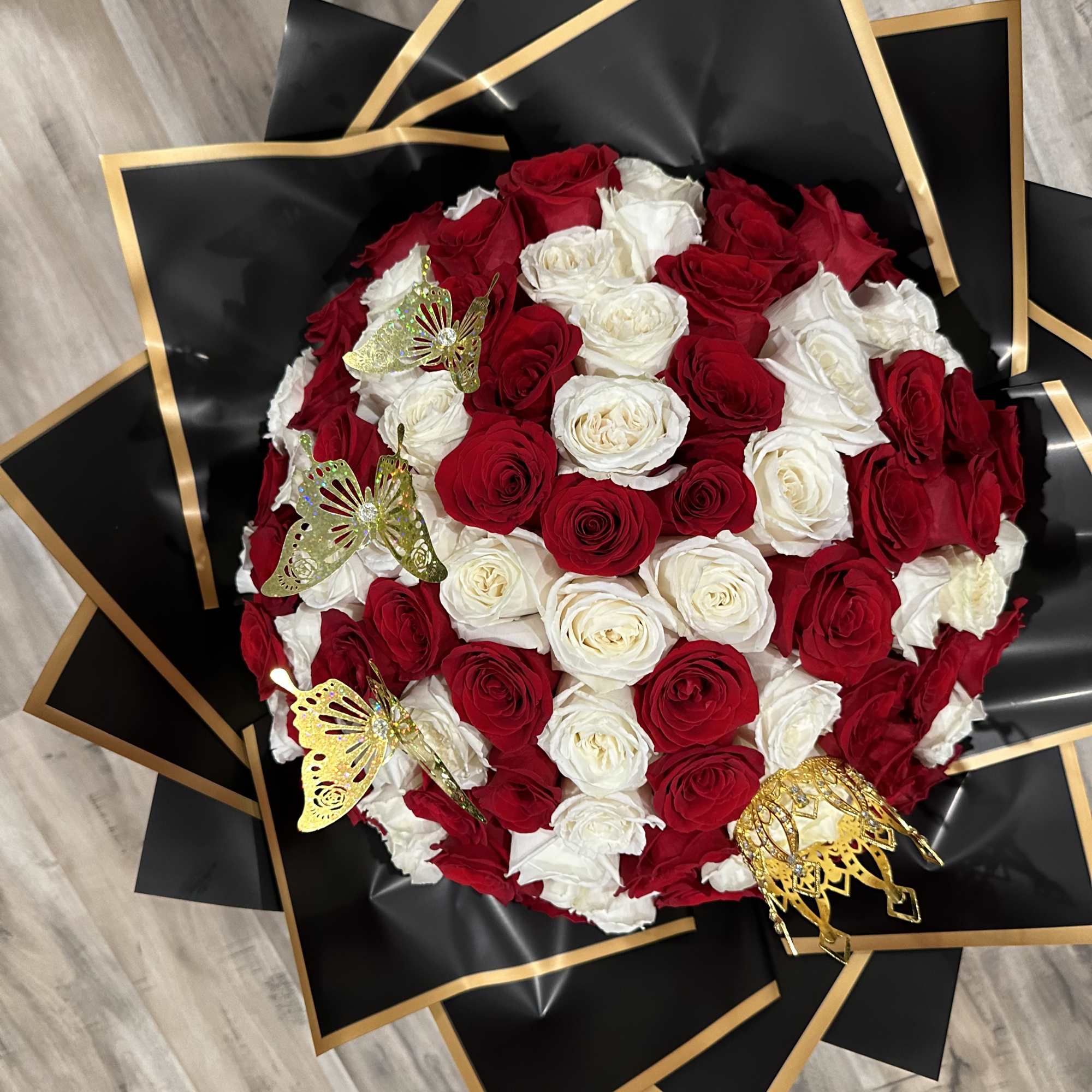 Surprise your love one with a 100 rose bouquet to win your