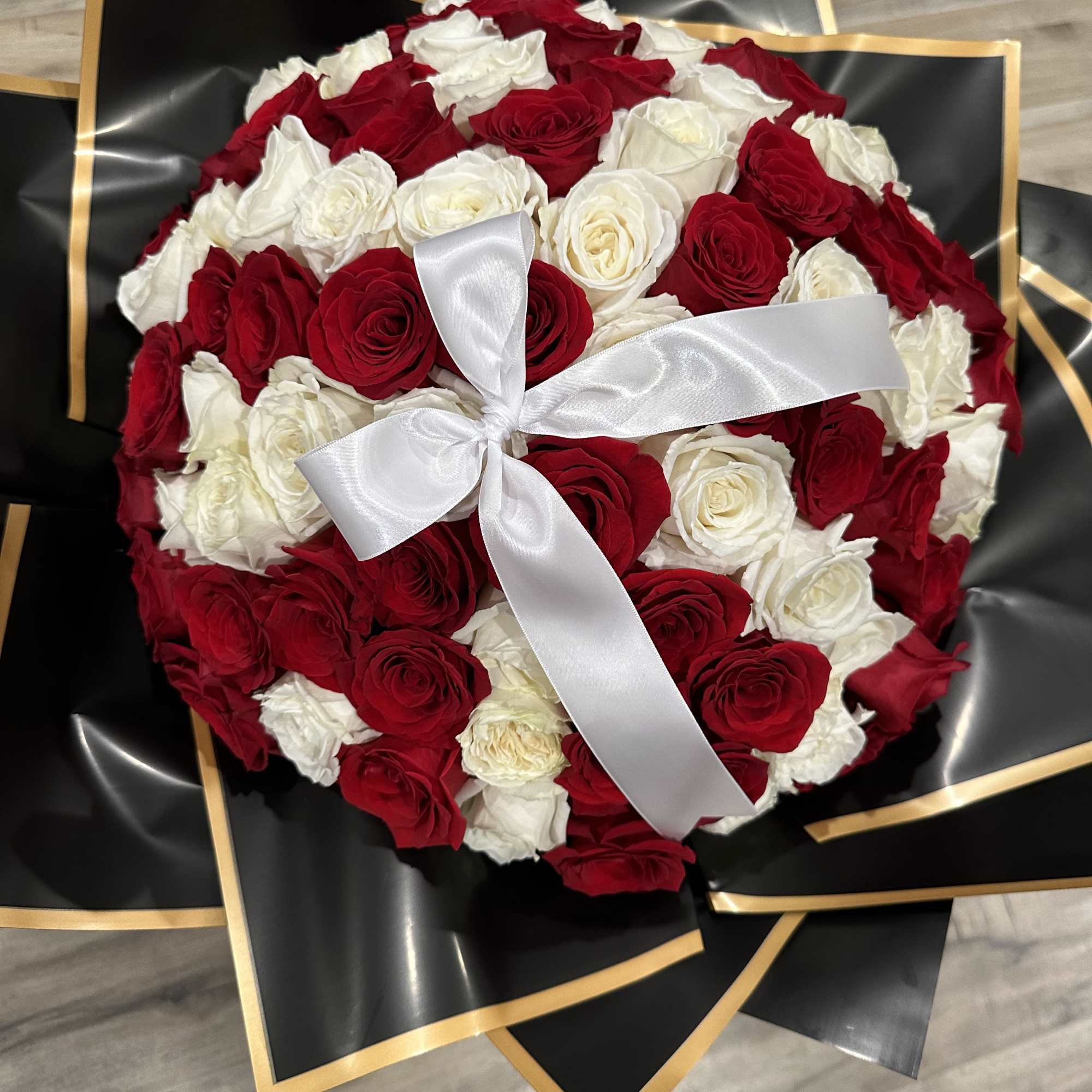 Surprise your love one with a 100 rose bouquet to win your