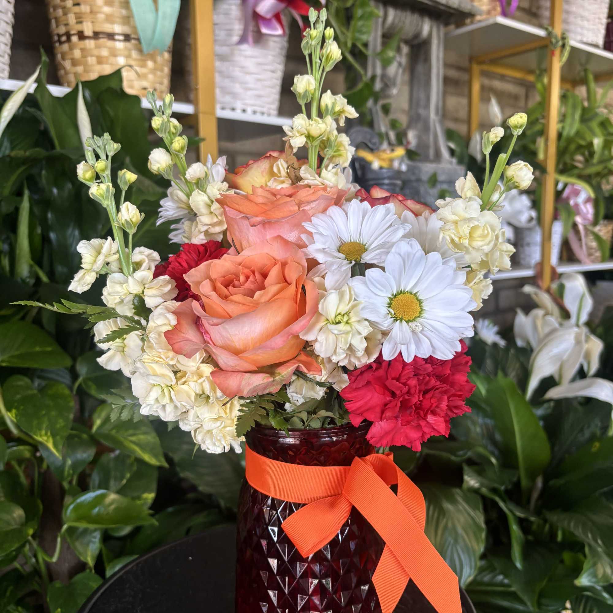 fresh flowers in vase setting 