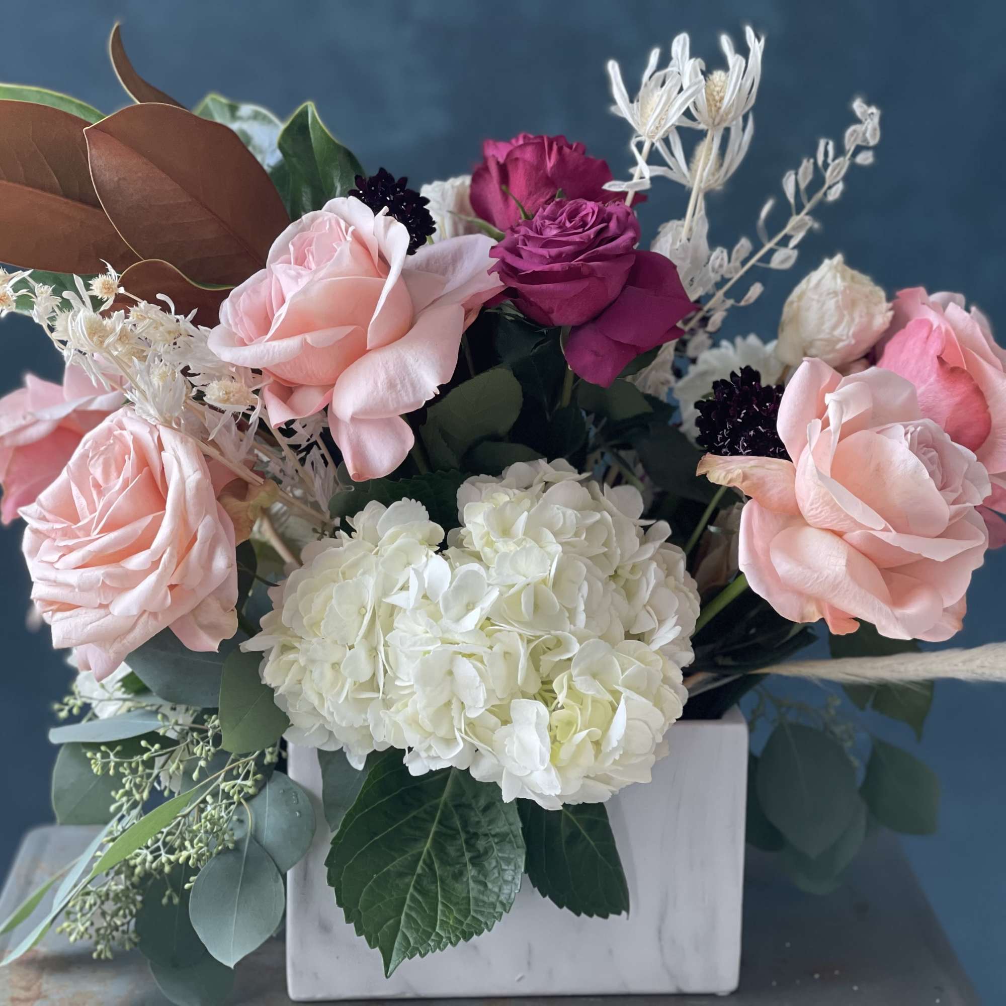 12 stunning rose- colors Will vary. Color scheme will remain the same.