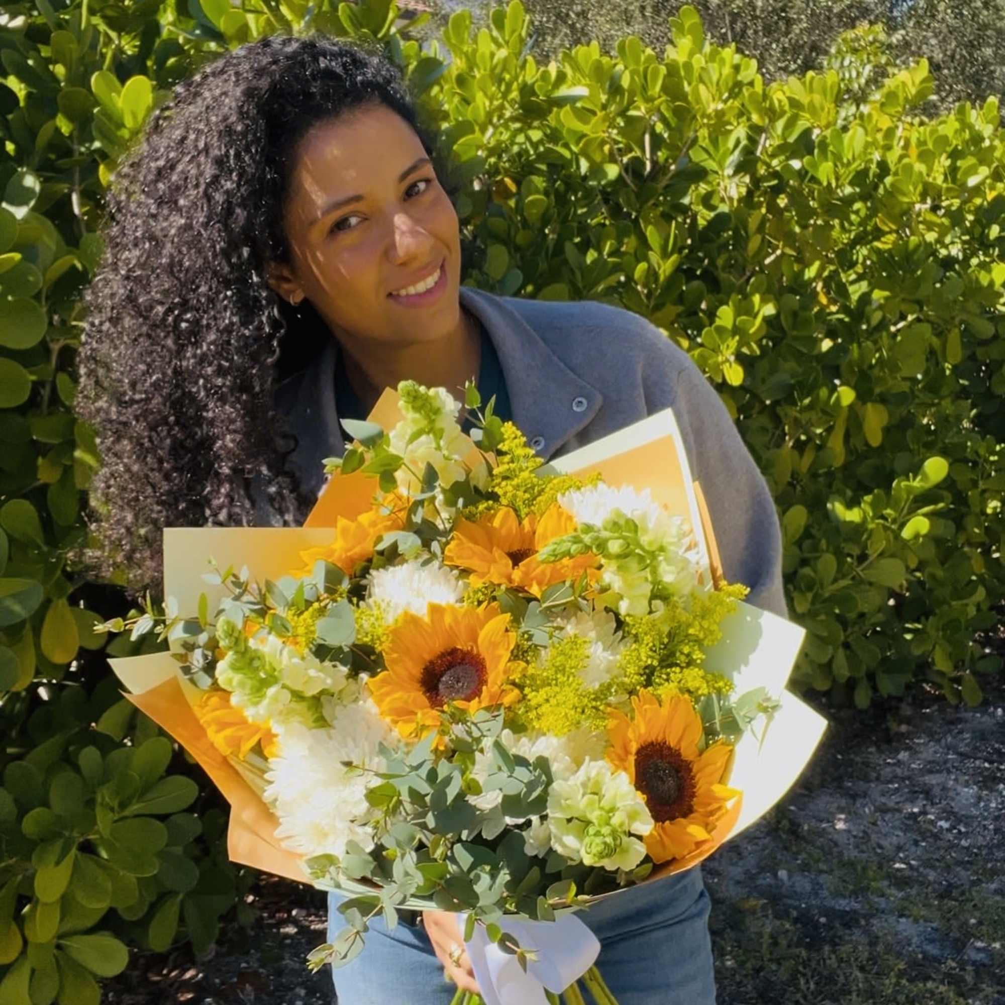 Sunshine Bloom is a joyful, radiant bouquet designed to brighten any day.