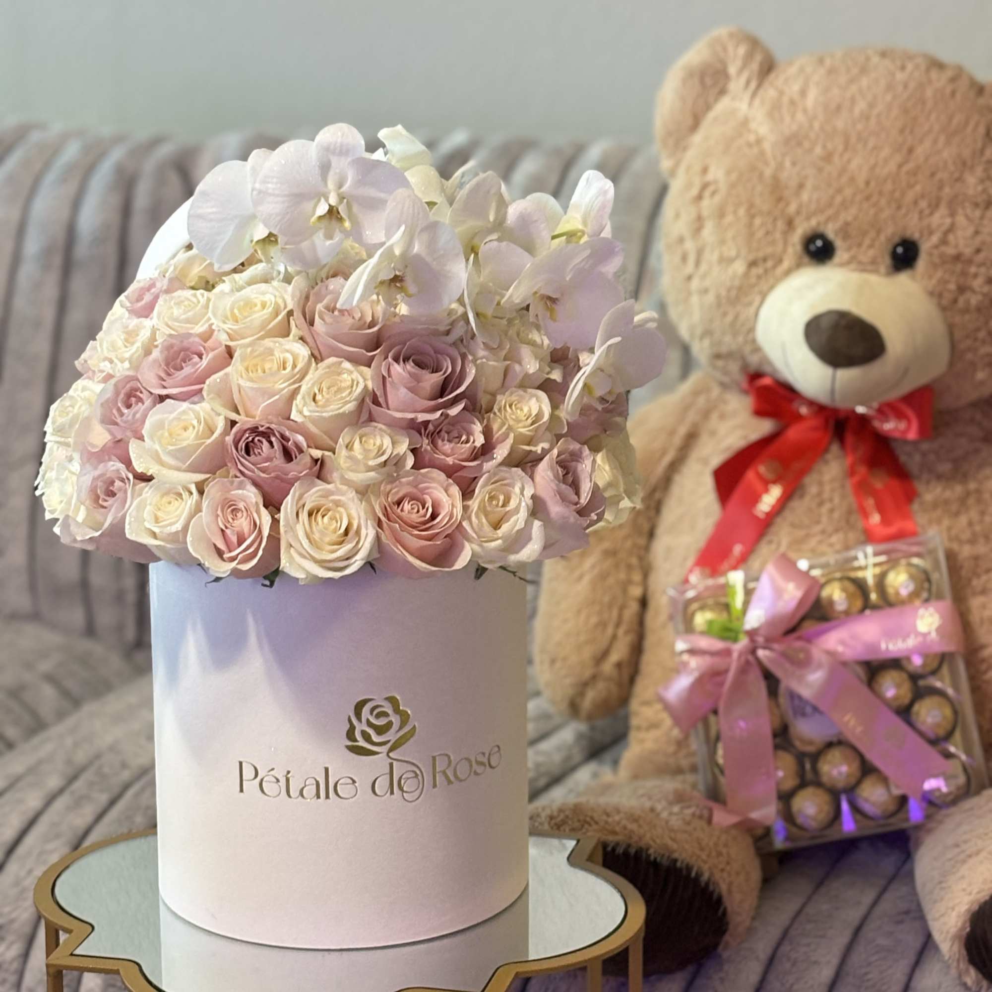 A timeless arrangement featuring 36 fresh pink and white roses complemented by