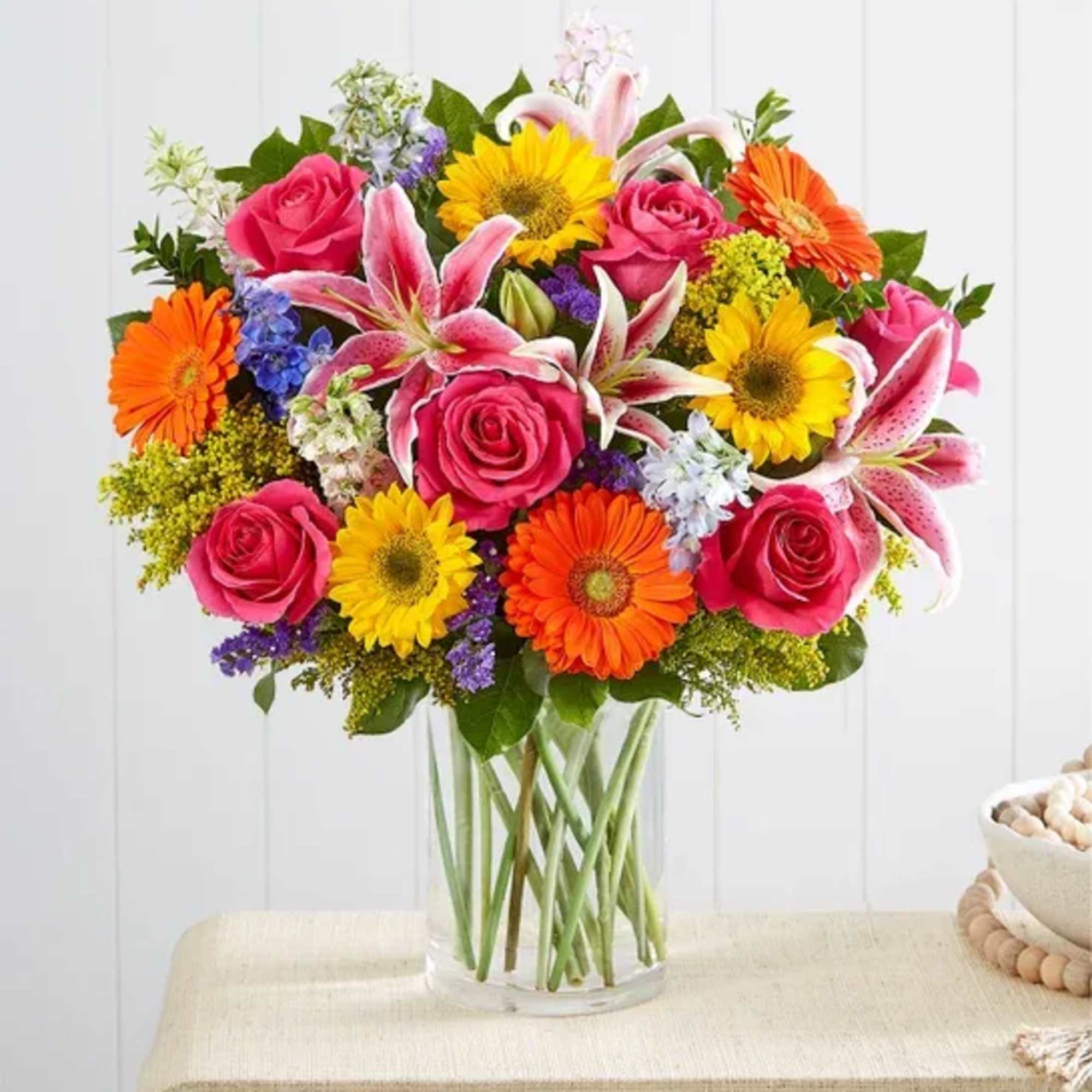 Our Garden Pathway bouquet will delight with its fresh-from-the meadow design. Hand-gathered