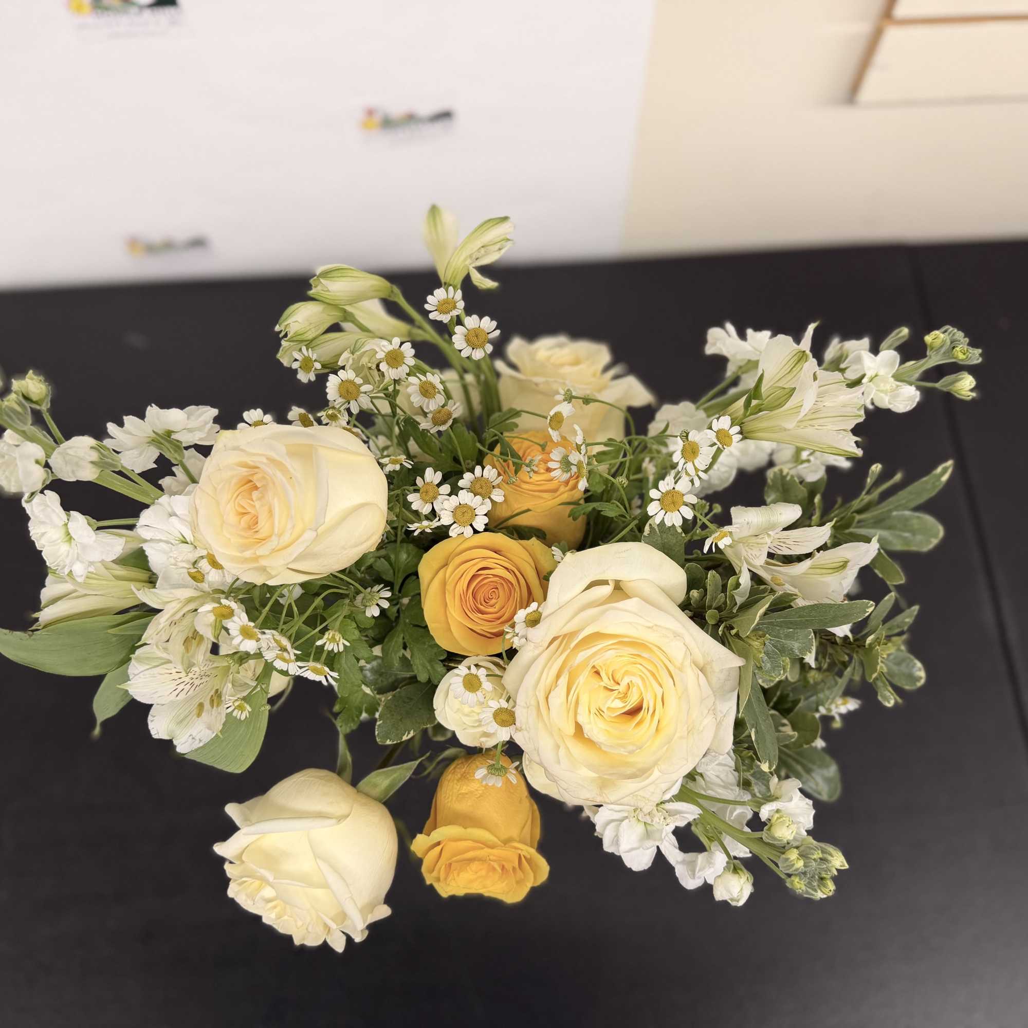 This fun and bright arrangement is perfect for the holidays and matches