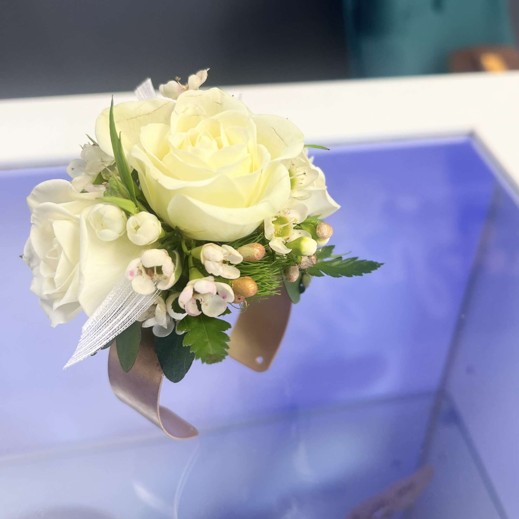 A classic white corsage hand-made that compliments any outfit. A beautiful addition