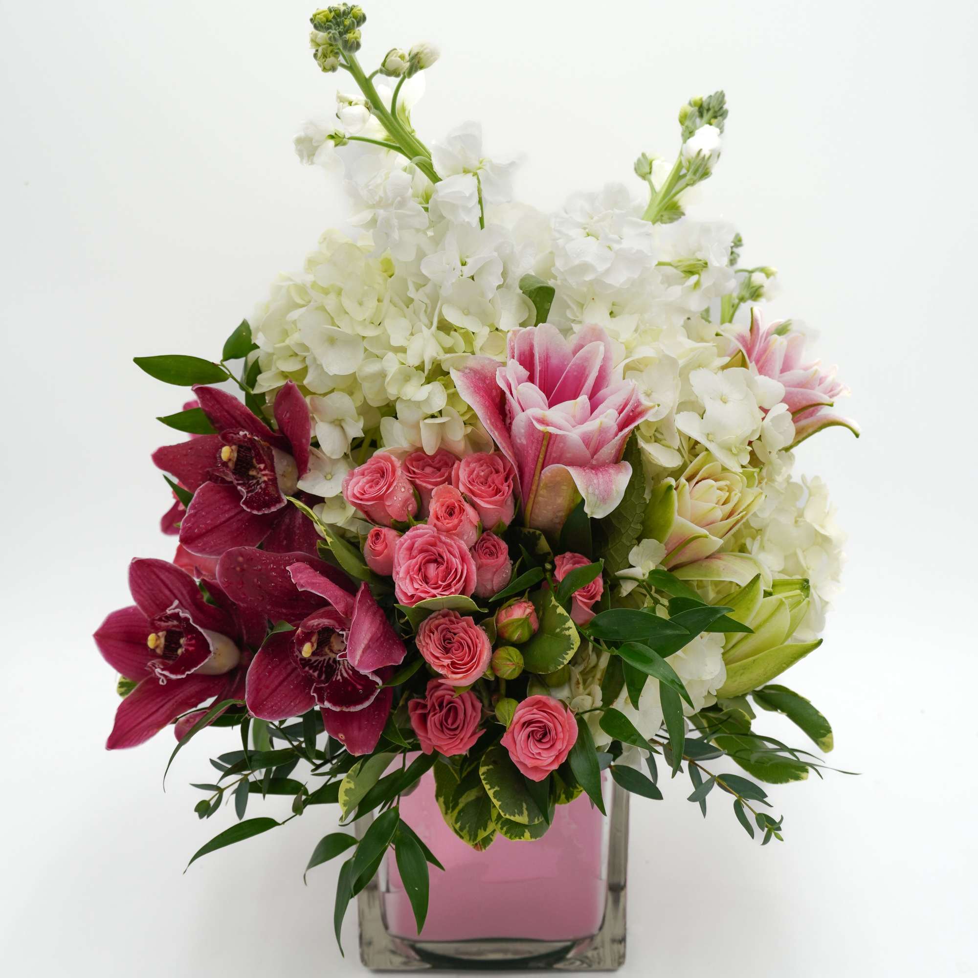 Pink lilies , stock , white hydrangeas , italian ruscus , light