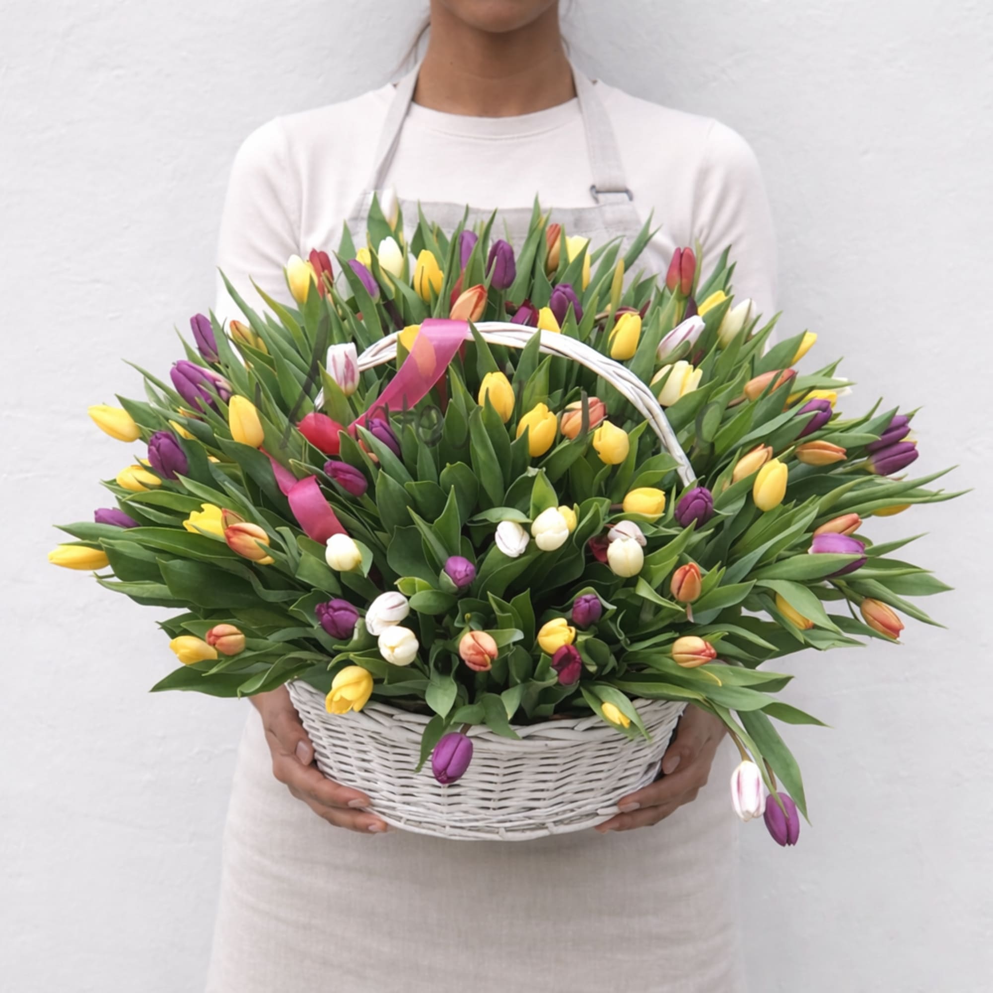 An abundant burst of joy&mdash;The Tulip Overflow features 100 fresh assorted tulips