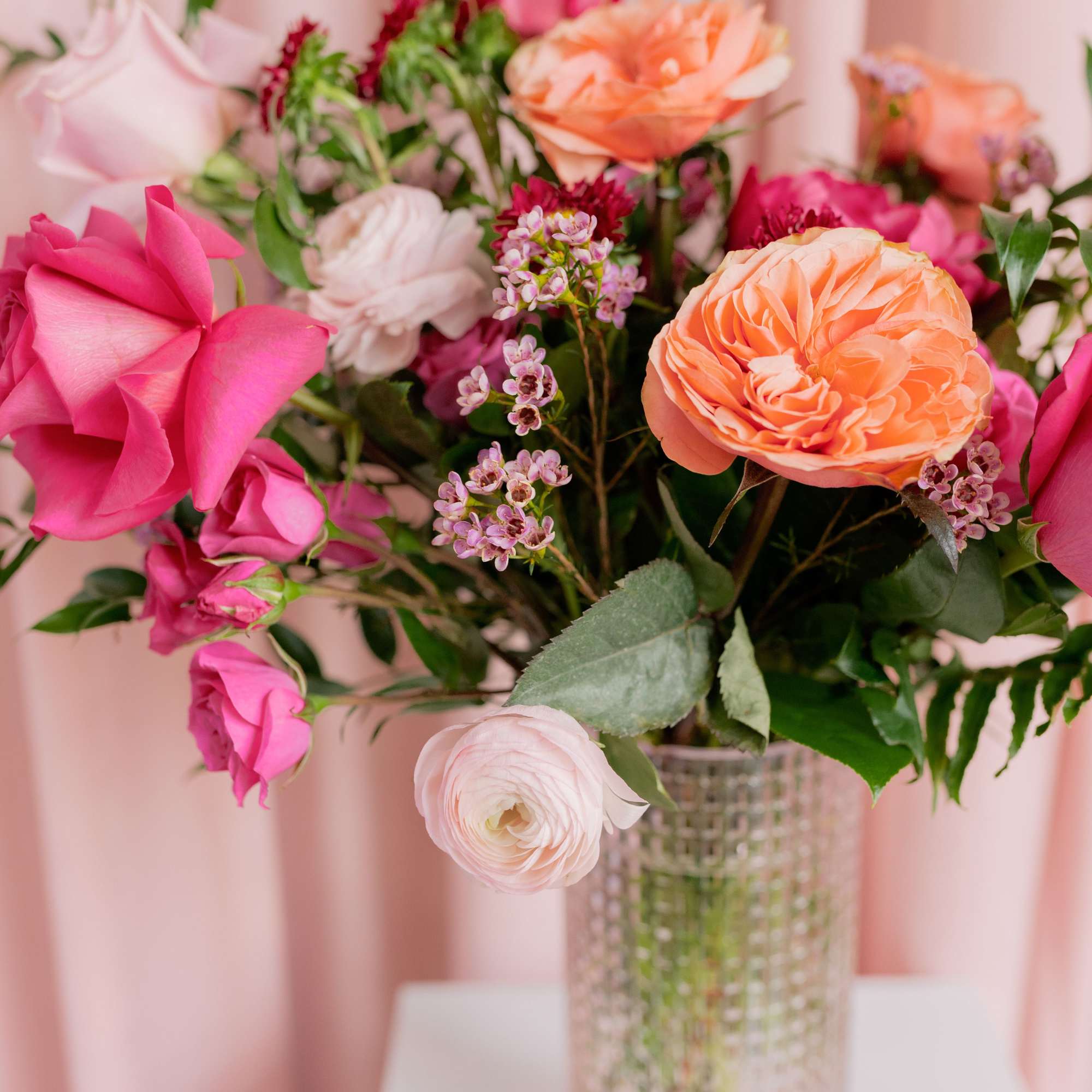 Soft, elegant, and full of charm &mdash; this pale pink dimpled vase
