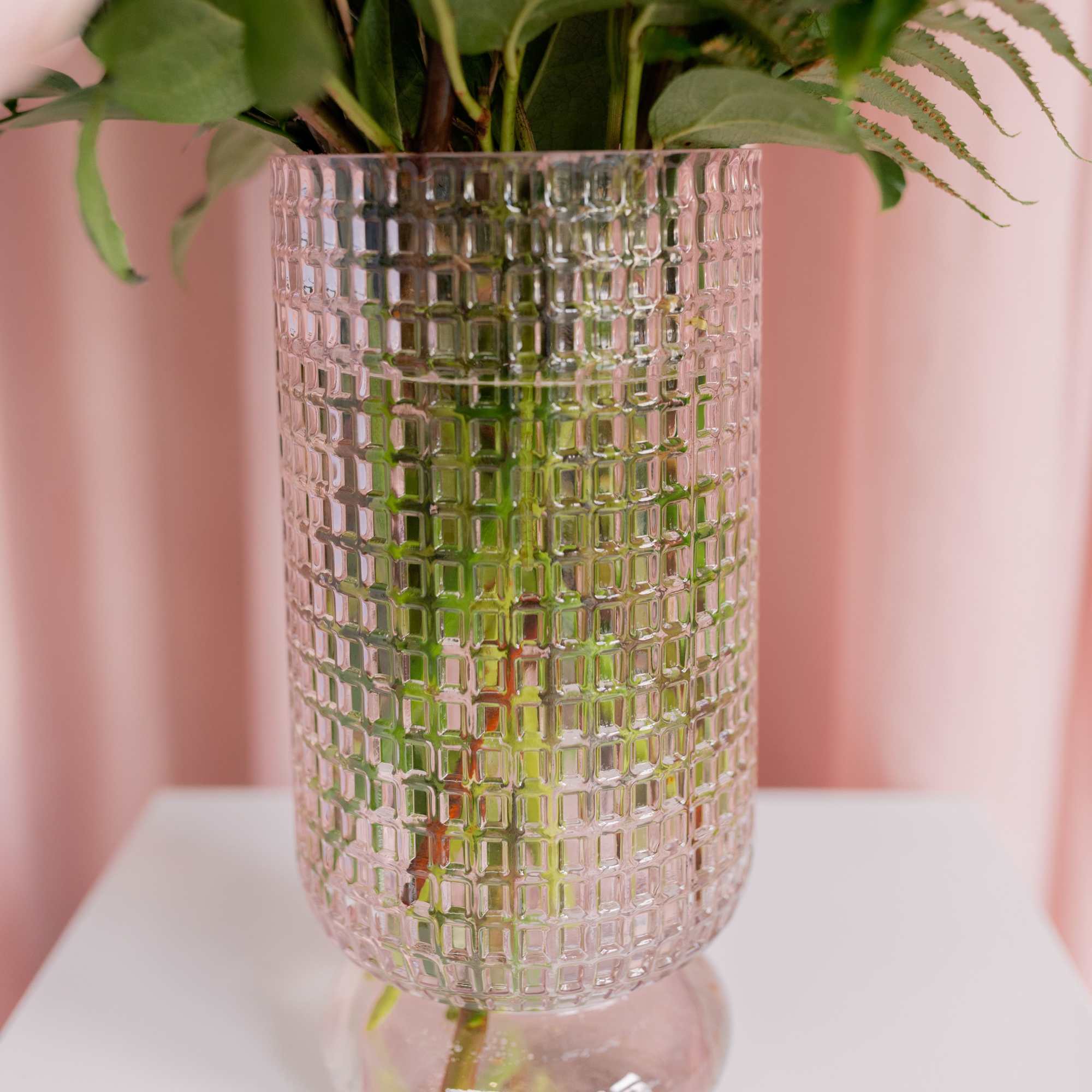 Soft, elegant, and full of charm &mdash; this pale pink dimpled vase