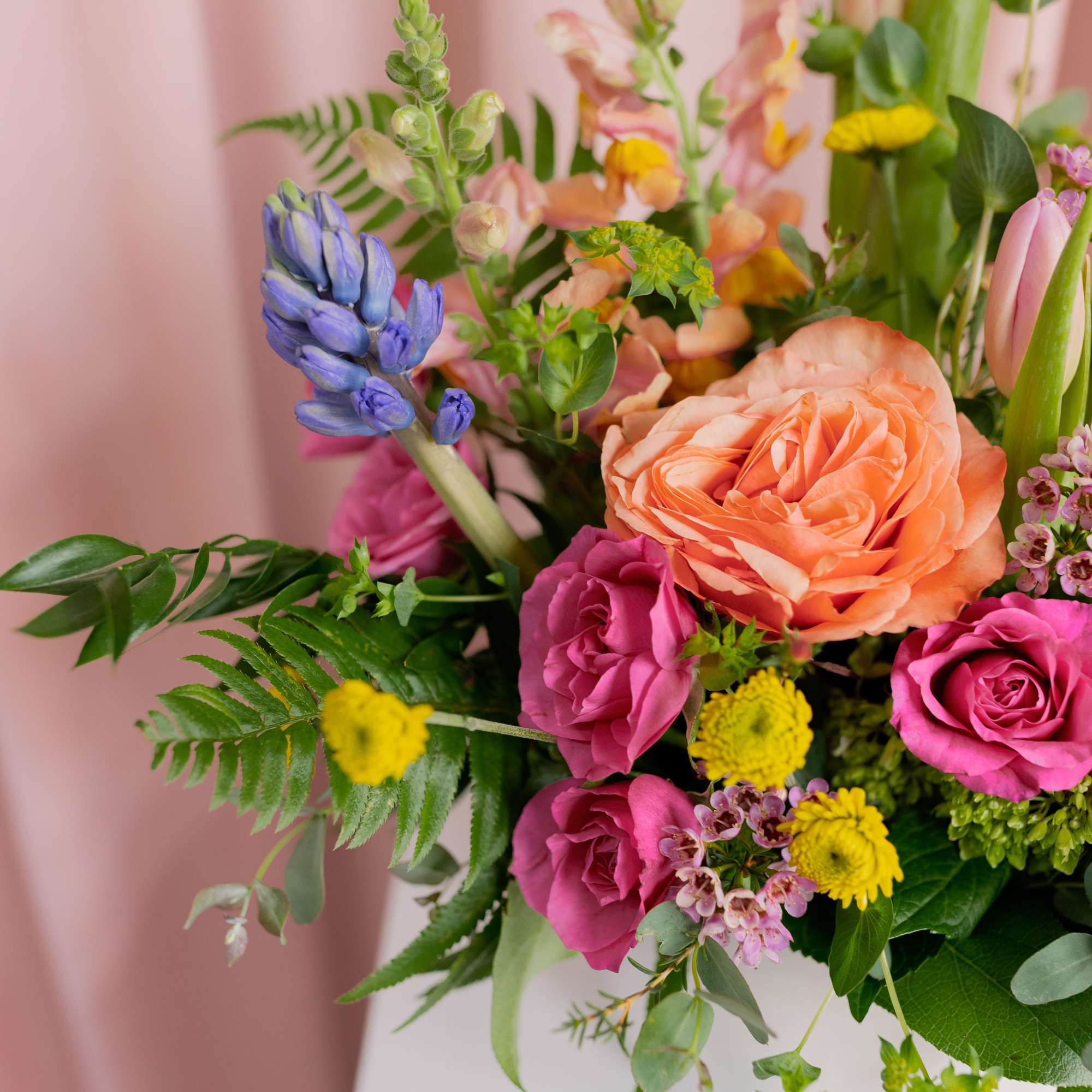 Fast-forward to spring! This seasonal arrangement is full, fresh, and designed to