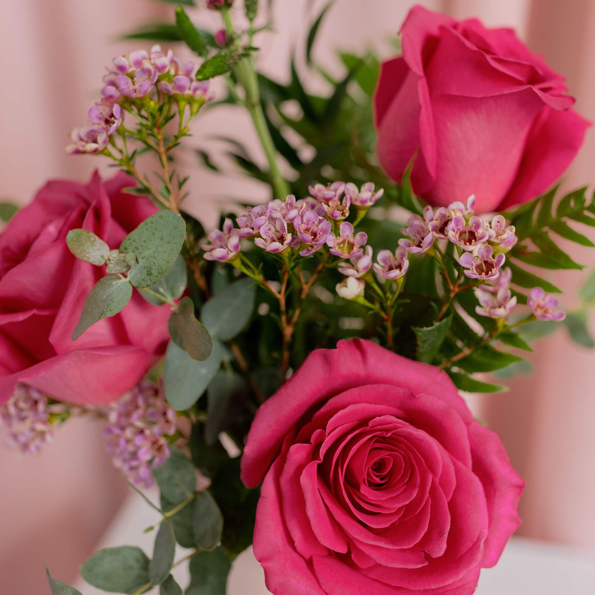 Delicate, charming, and effortlessly elegant &mdash; this petite arrangement features pink roses