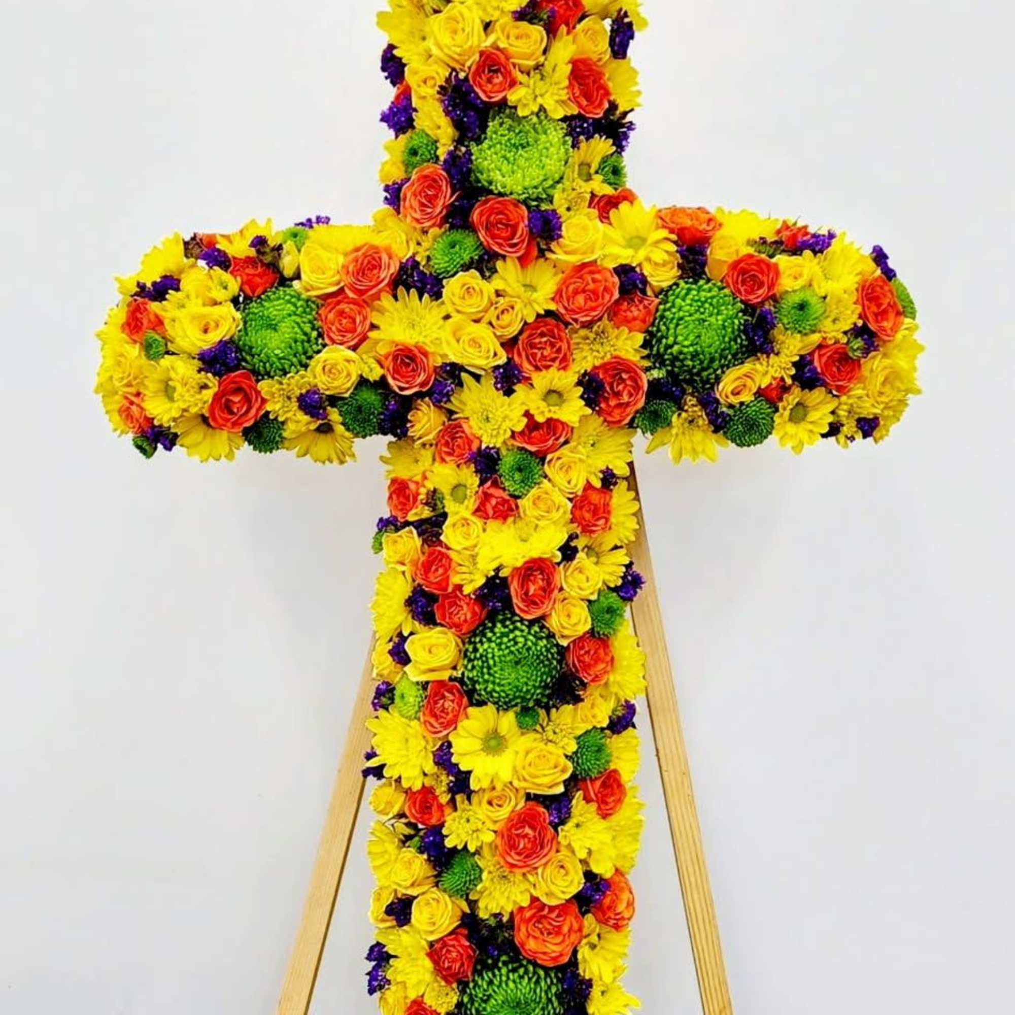 Celebrate a life well-lived with the Shine Brightly Cross, a radiant tribute