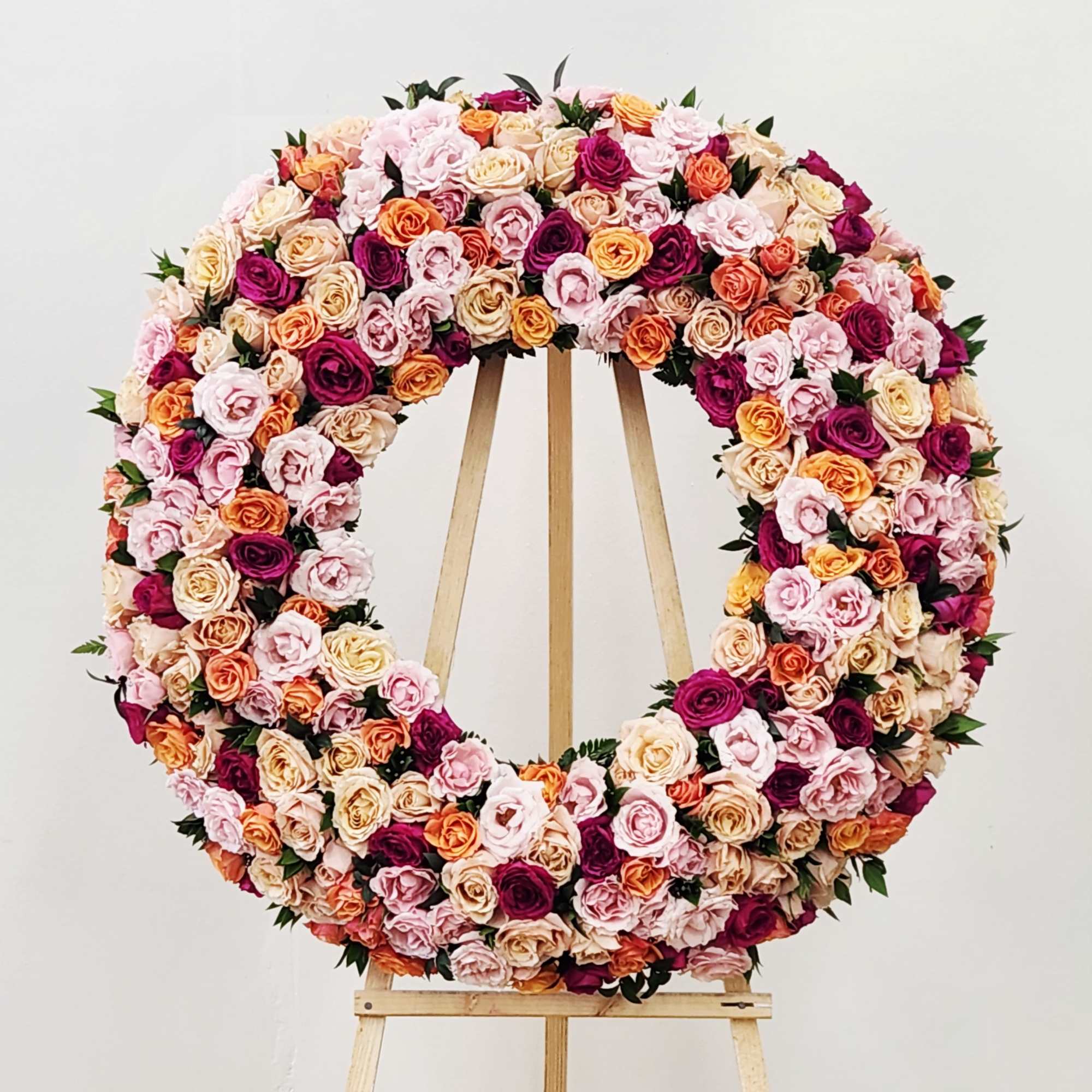 The Garden Rose Wreath brings a delicate and luxurious touch to any