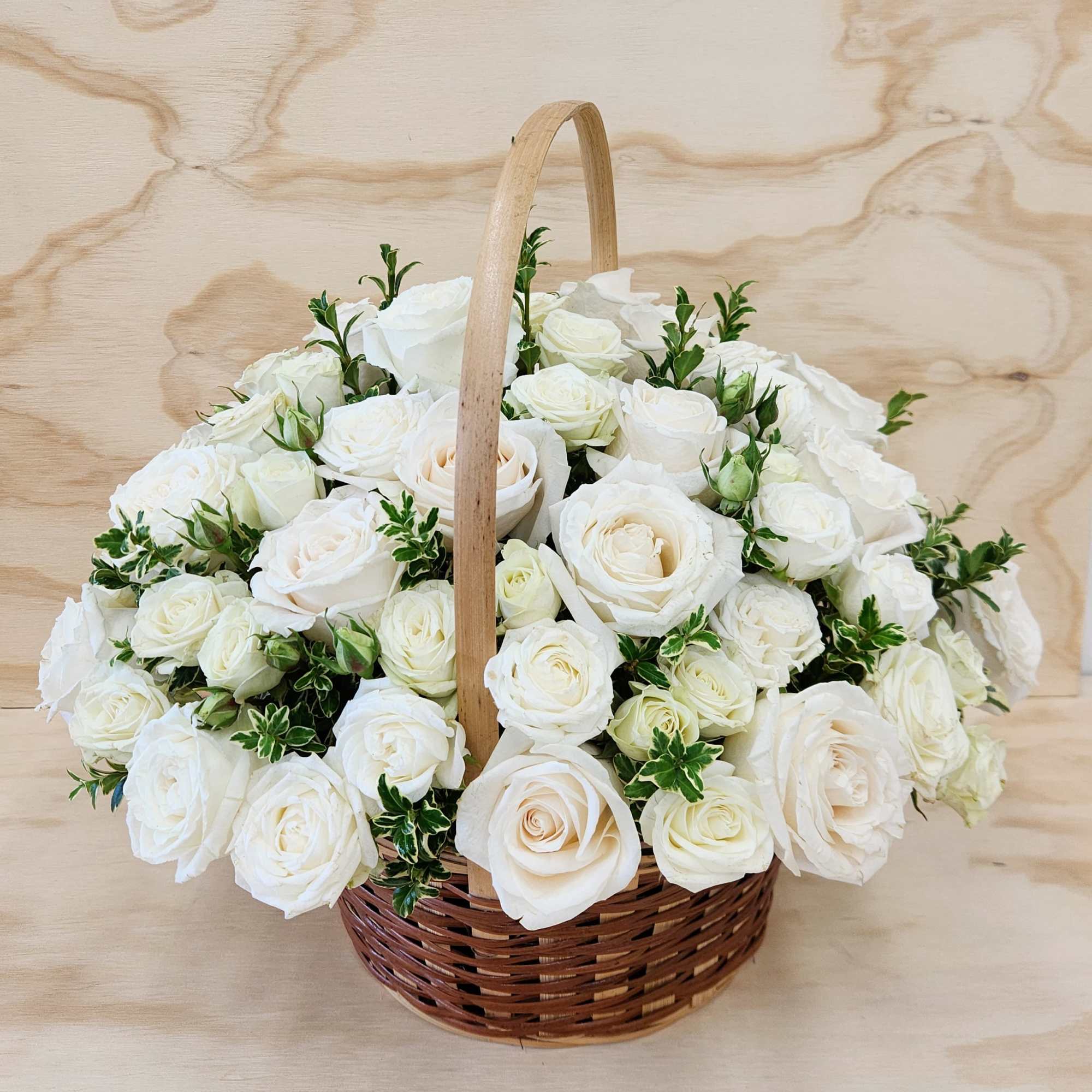 Our Basket of All White Roses is here to help you express