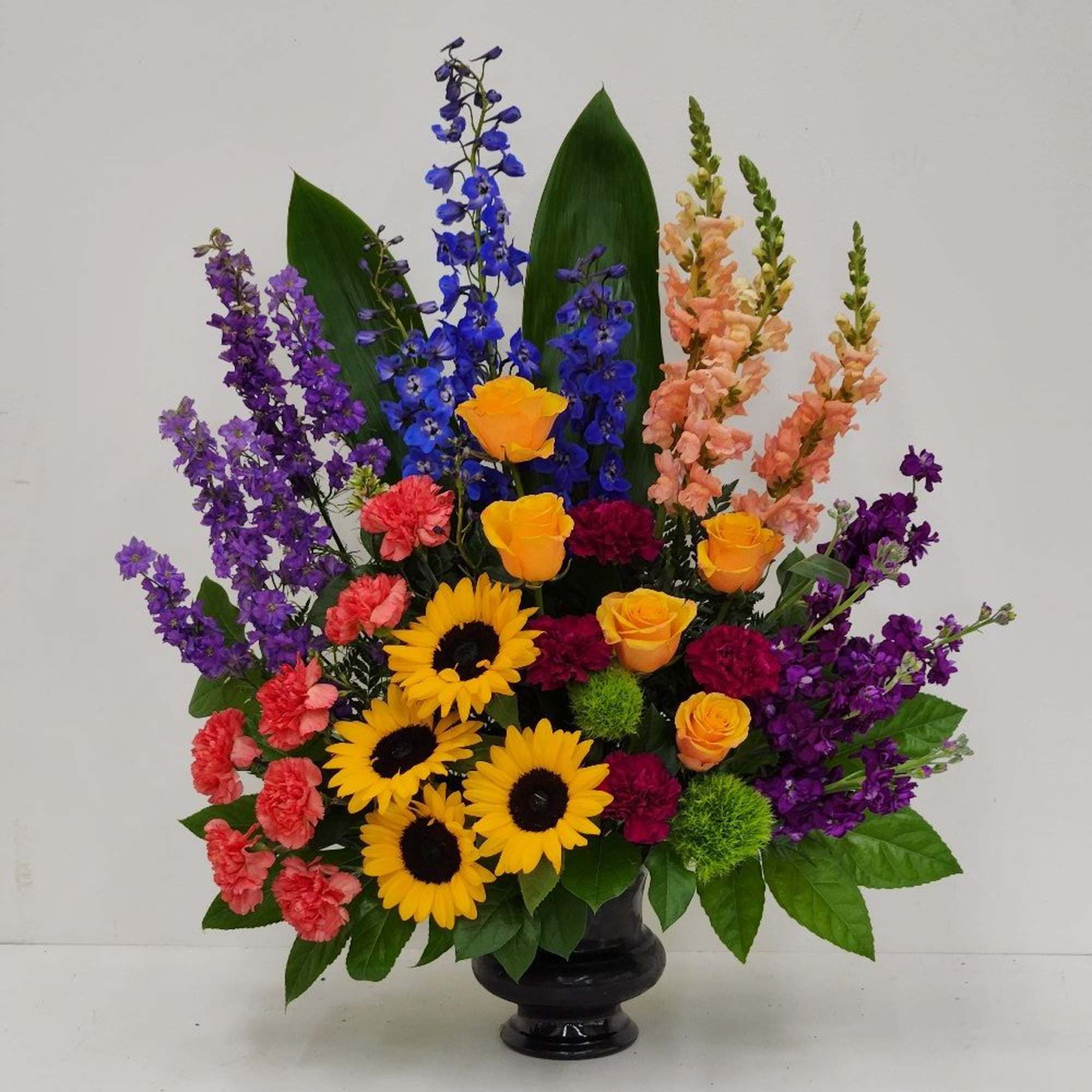 Celebrate a life filled with joy and vitality with this striking vase