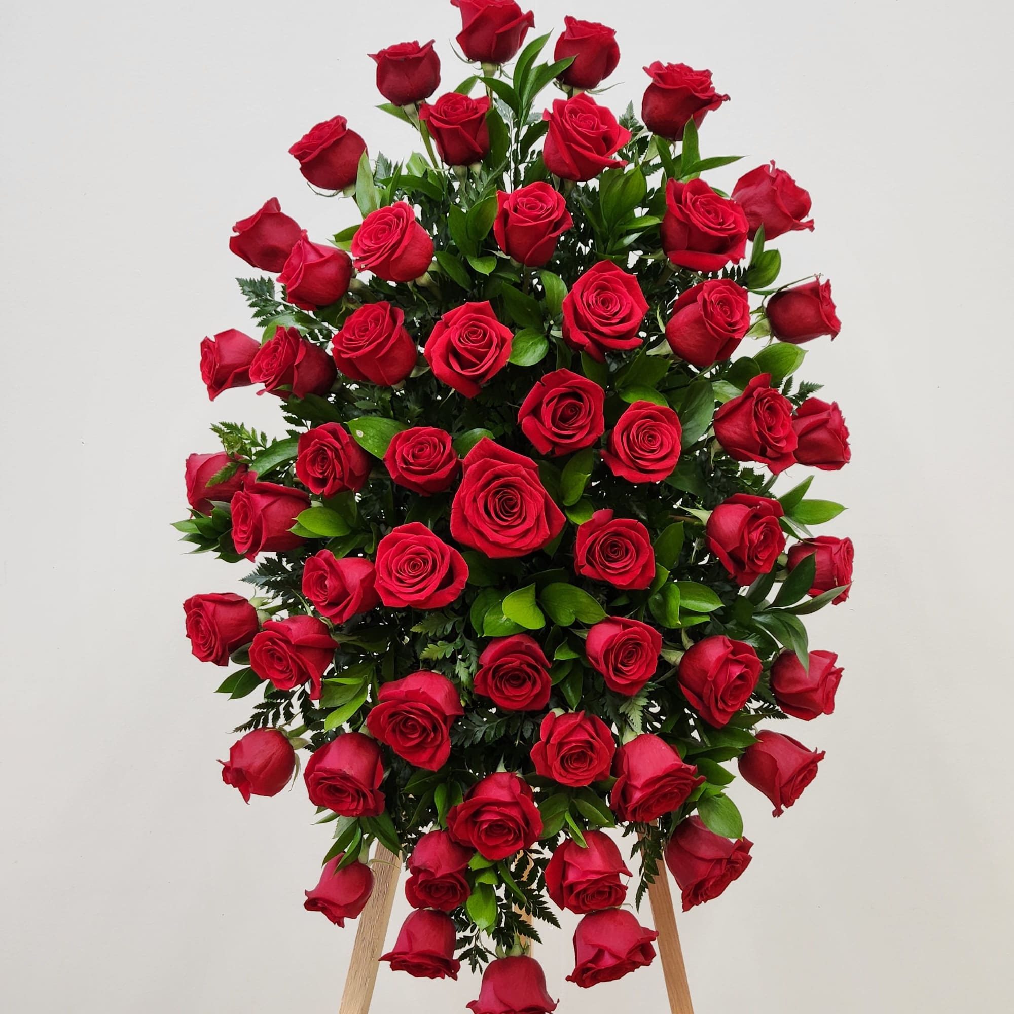 Express deep emotions with the All Red Roses Spray. This elegant arrangement
