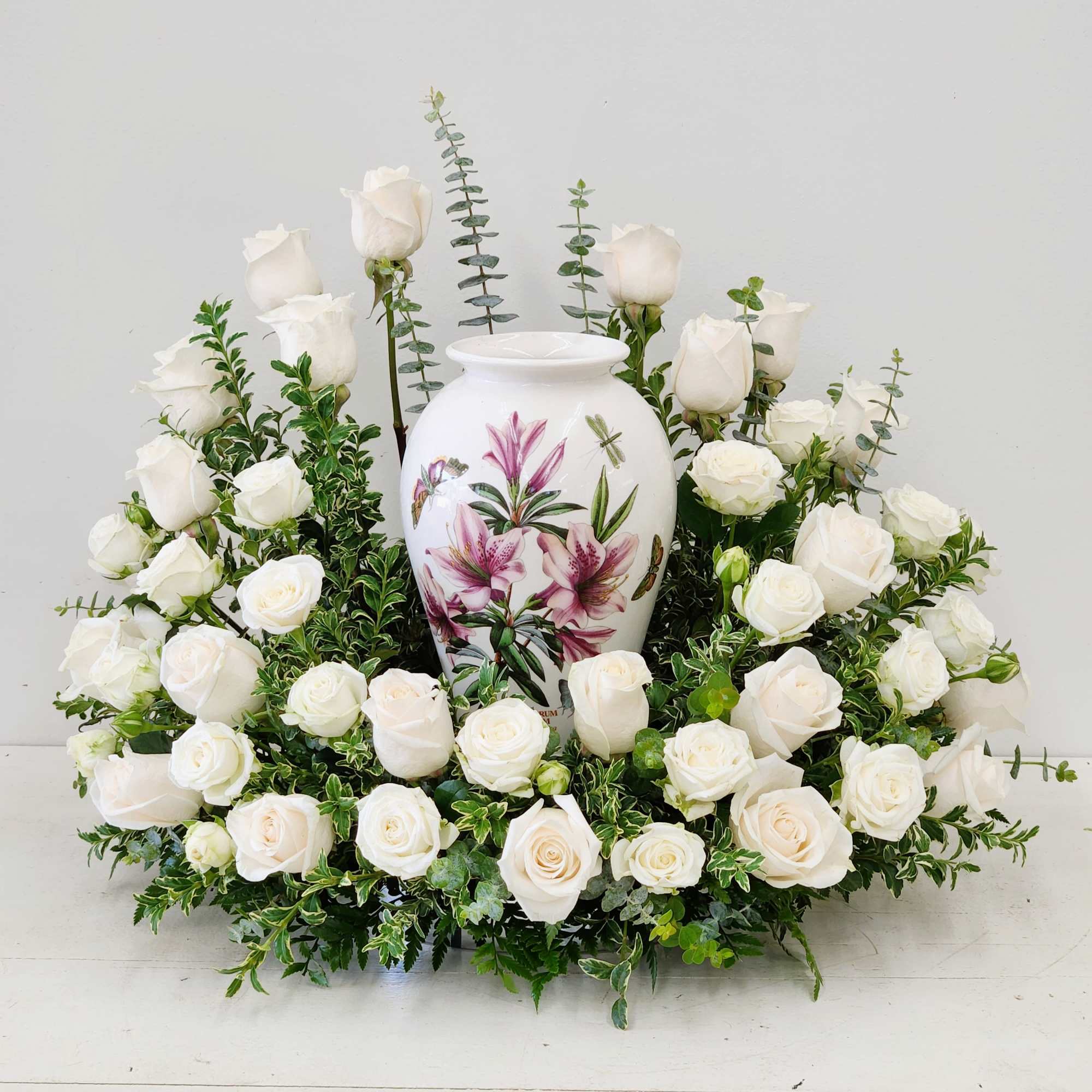Sweet Remembrance honors your loved one with timeless elegance. This all-white cremation