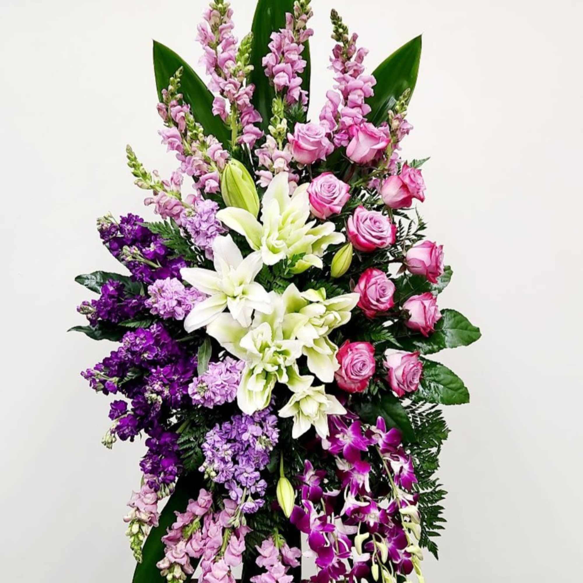 Celebrate a cherished soul with the Living Spirit Spray. This beautiful and