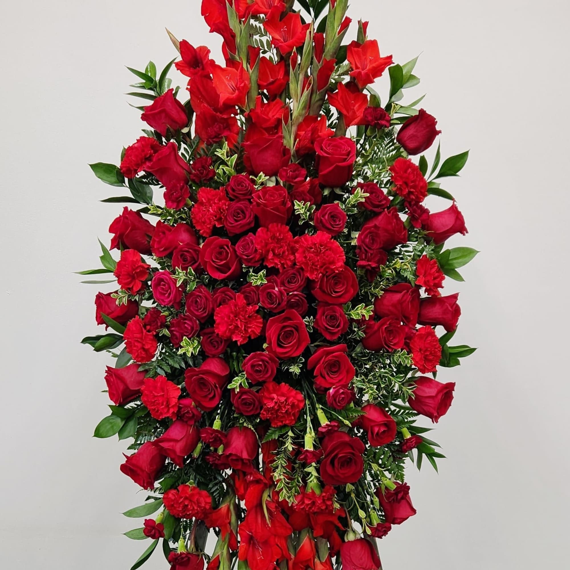 Express your heartfelt condolences with the With Love and Sympathy Spray. Designed