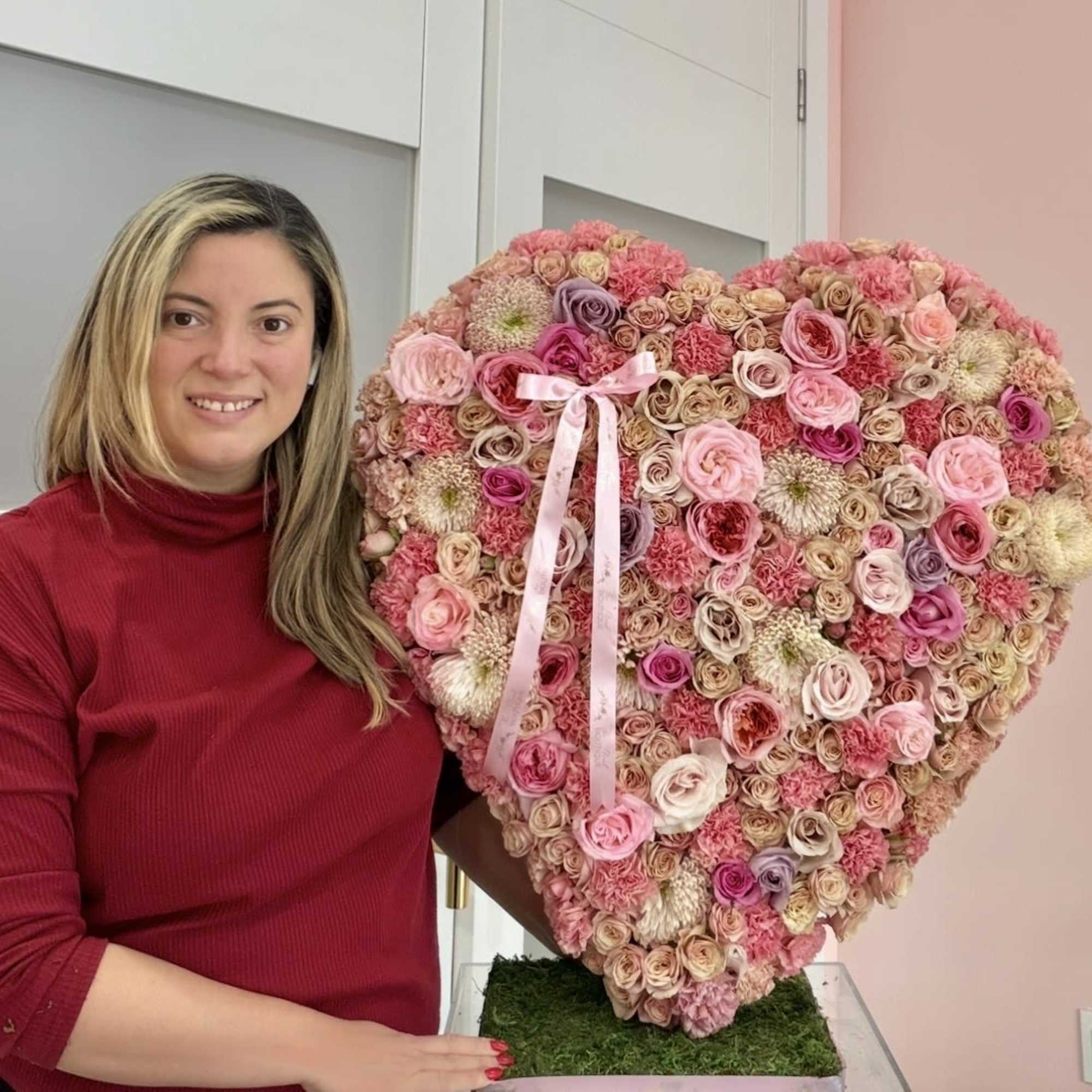 A breathtaking large heart-shaped floral arrangement designed to make a lasting impression.