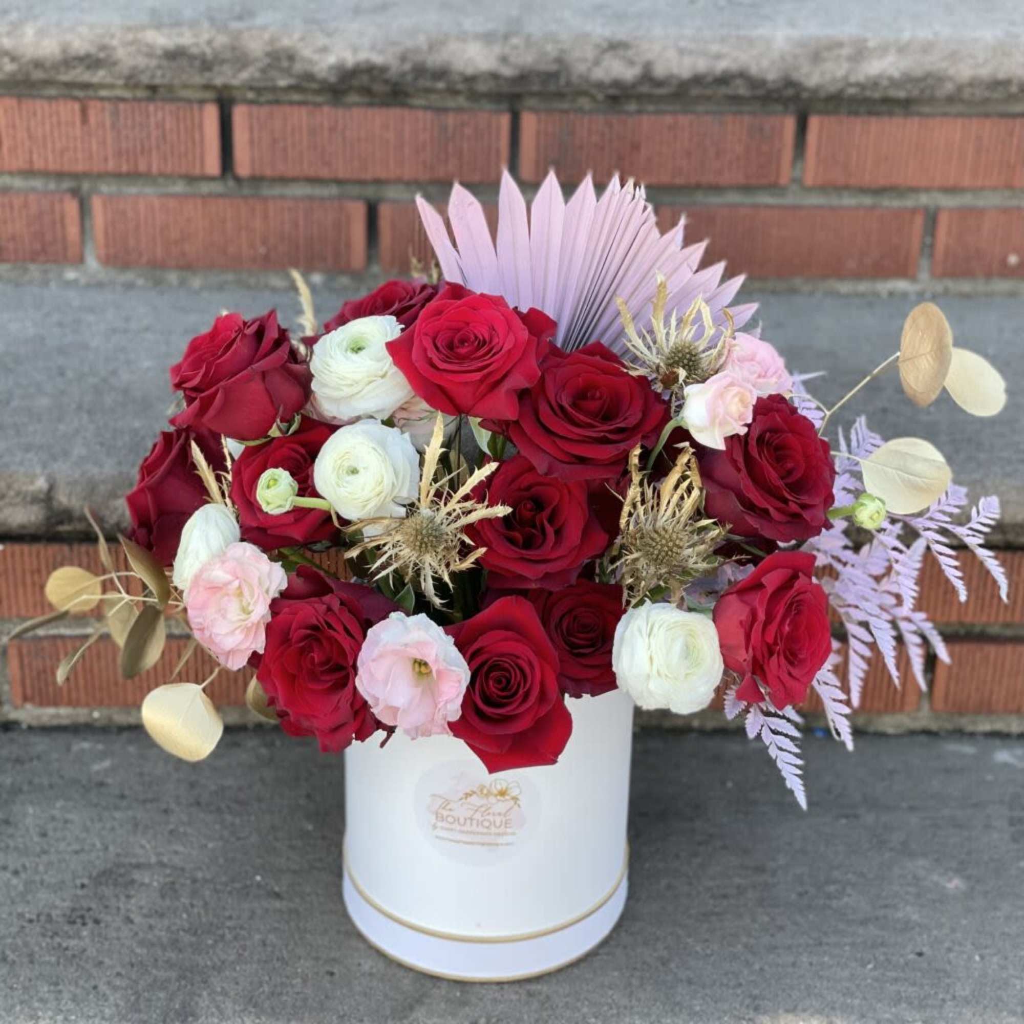 Make a statement with timeless elegance. Our In Love With You arrangement