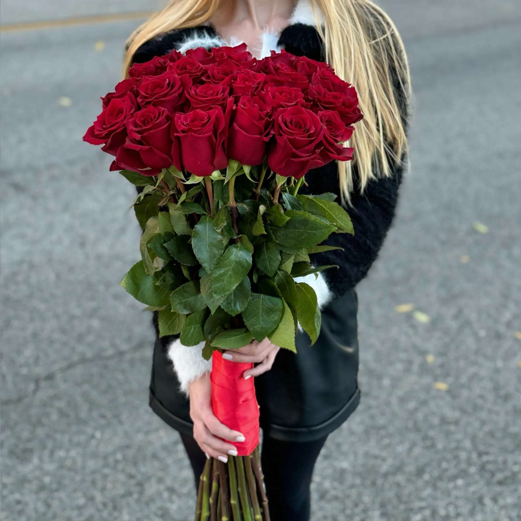 Make a bold statement with the red rose arrangement, beautifully wrapped in