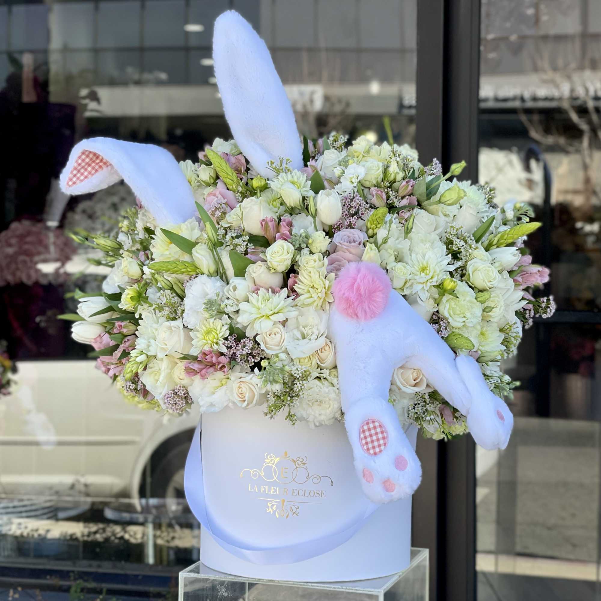 All whites with a touch of blush pink 