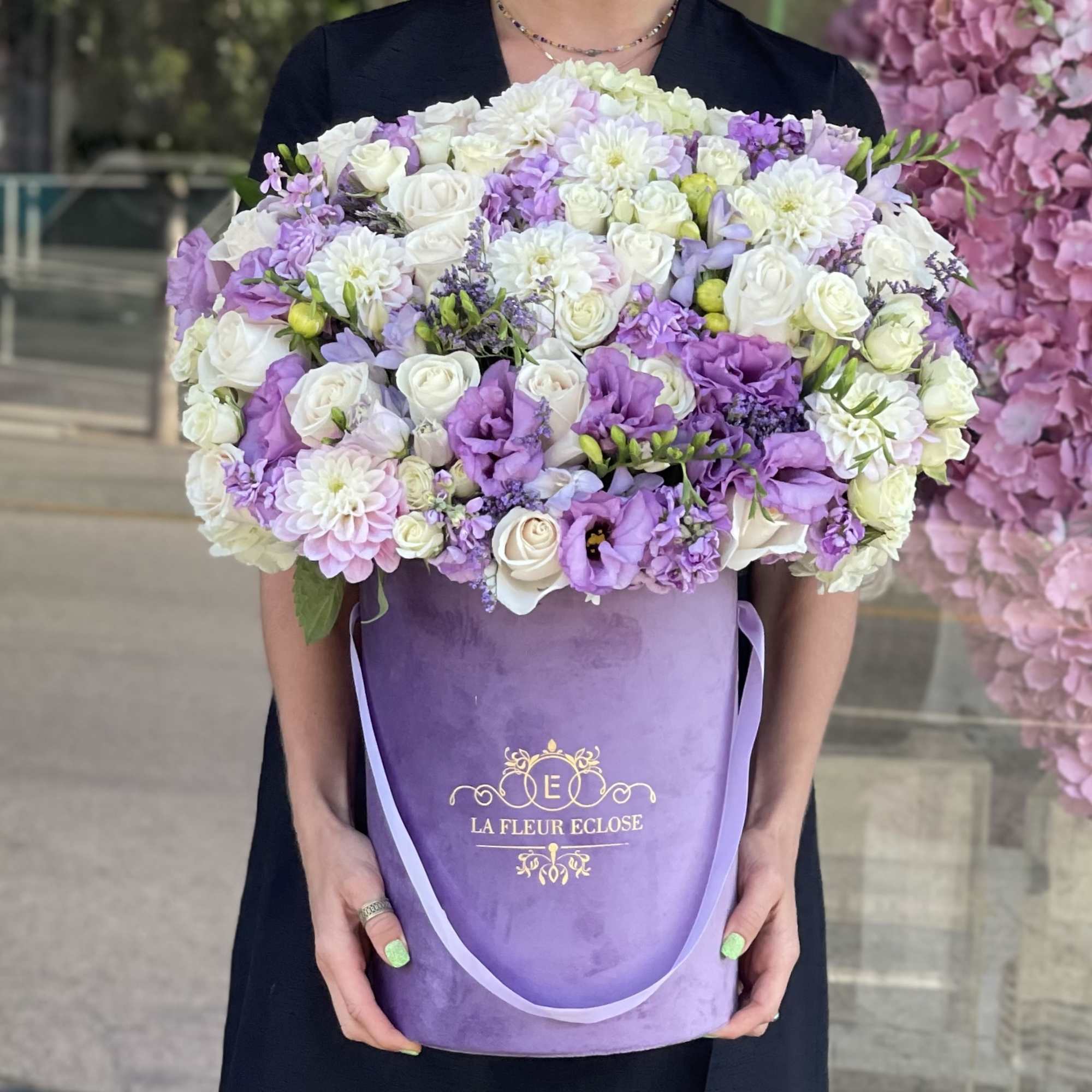 Beautiful arrangement of fresh flowers in our signature lavender velvet box 